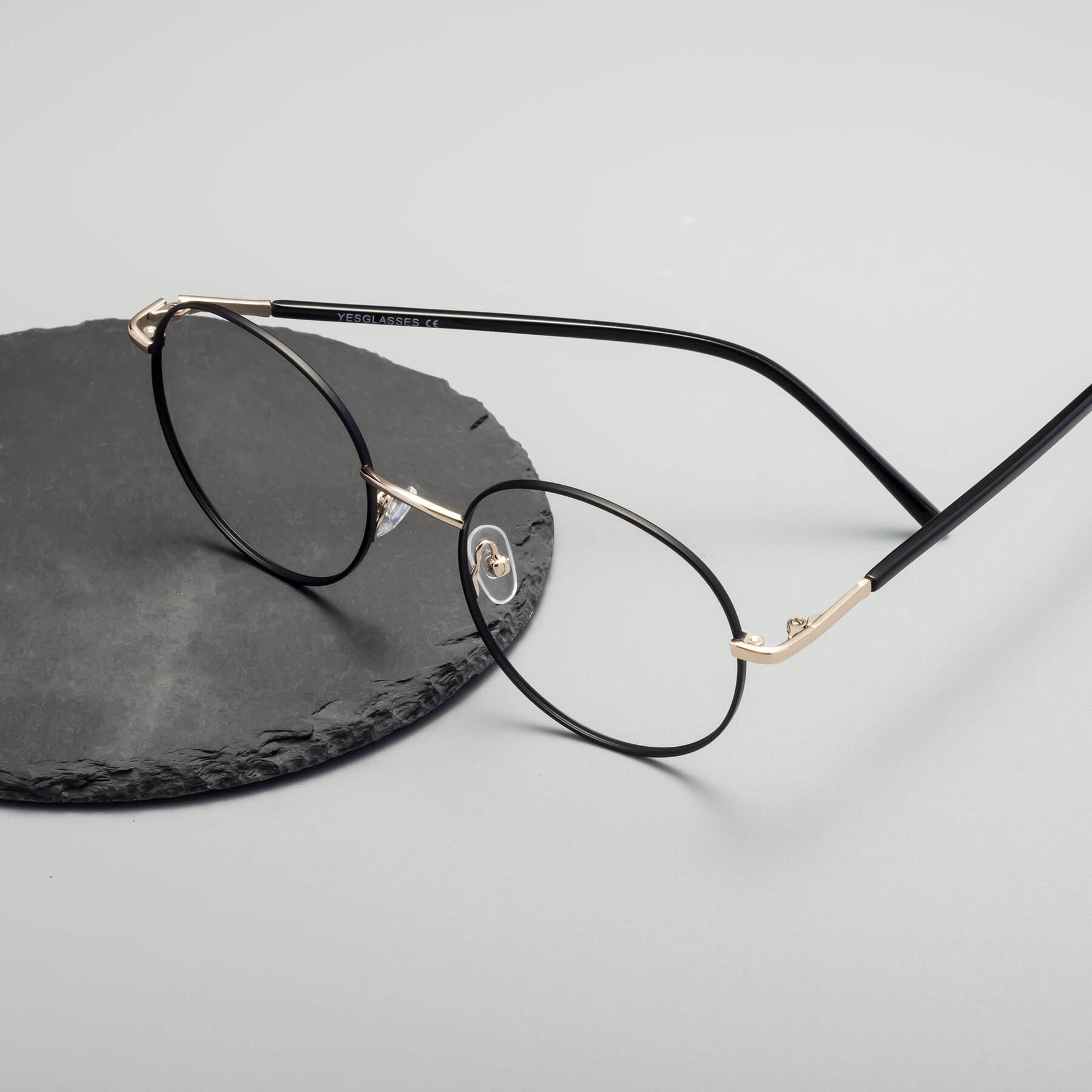 Lifestyle photography #2 of Cosmos in Black-Gold with Clear Blue Light Blocking Lenses