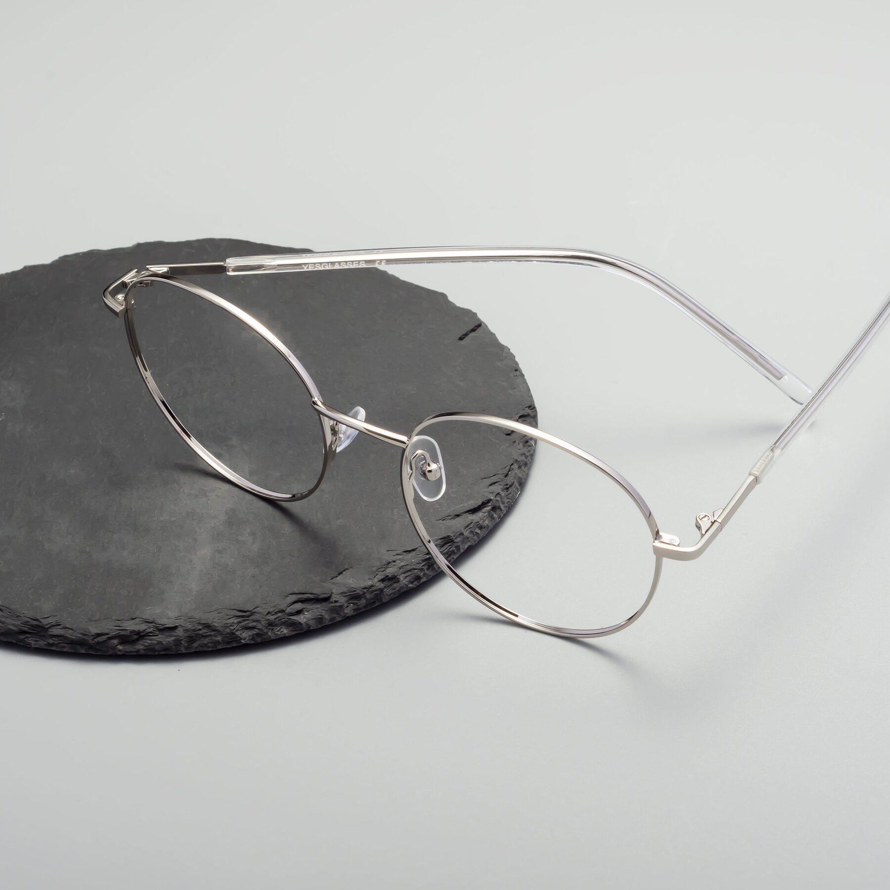 Lifestyle photography #2 of Cosmos in Silver with Clear Eyeglass Lenses