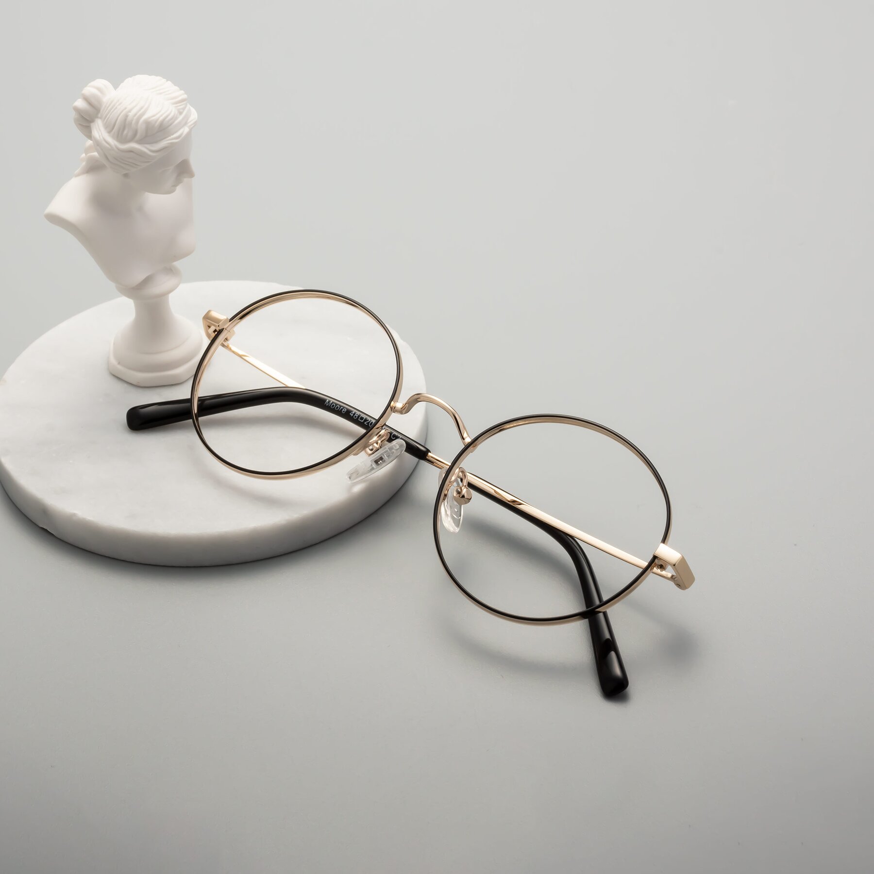 Lifestyle photography #1 of Moore in Black-Gold with Clear Reading Eyeglass Lenses