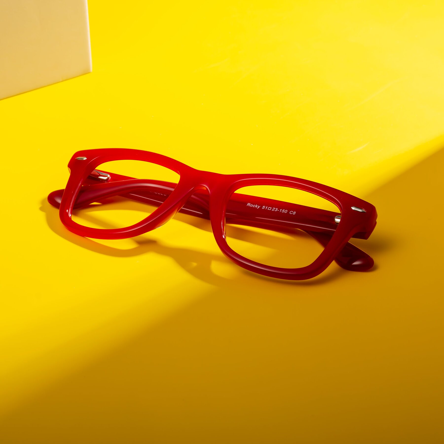 Lifestyle photography #1 of Rocky in Red with Clear Reading Eyeglass Lenses