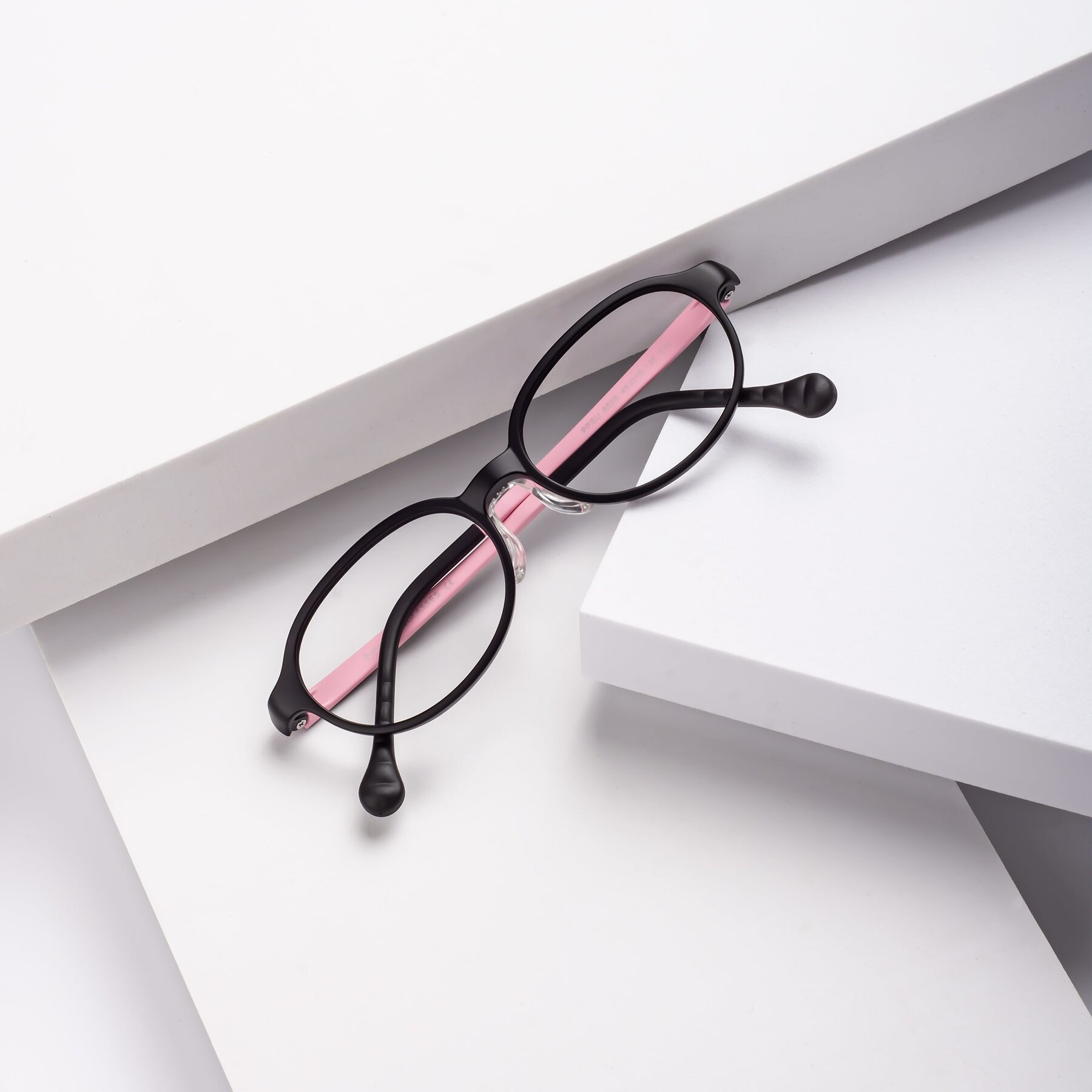 Women's lifestyle photography #1 of Reece in Black-Pink with Clear Eyeglass Lenses