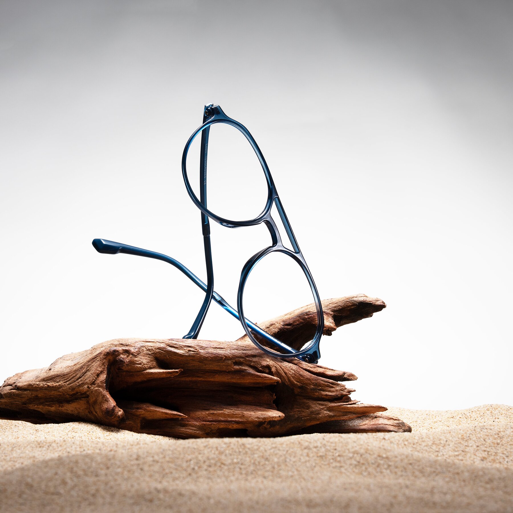 Lifestyle photography #2 of Louis in Blue with Clear Eyeglass Lenses