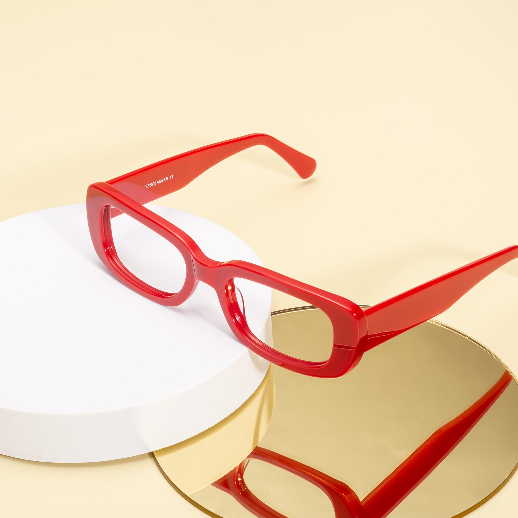Lifestyle photography #2 of Couch in Red with Clear Eyeglass Lenses