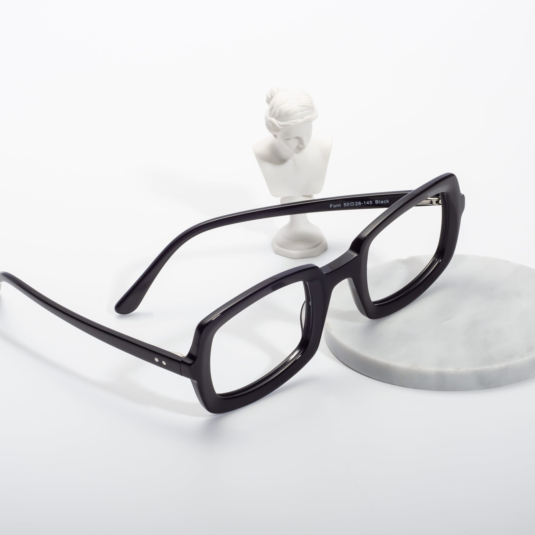 Lifestyle photography #2 of Font in Black with Clear Blue Light Blocking Lenses