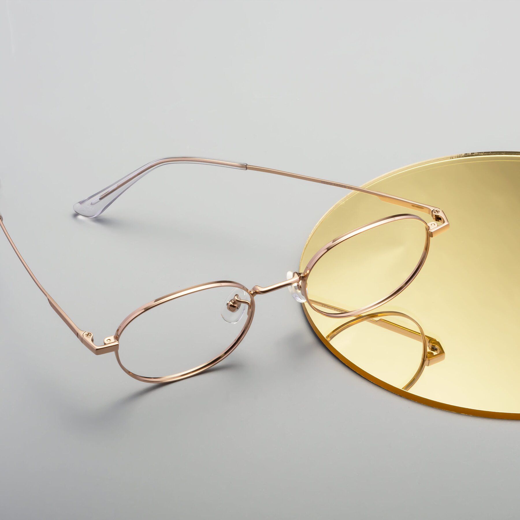 Lifestyle photography #2 of Tess in Gold with Clear Blue Light Blocking Lenses