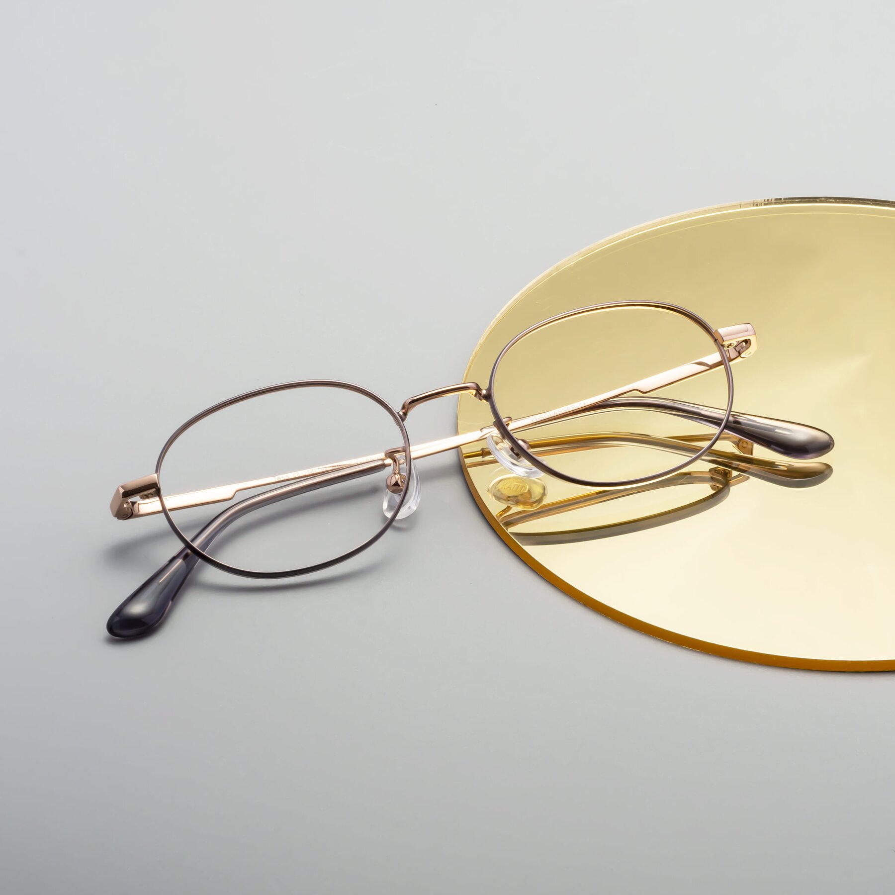 Lifestyle photography #1 of Tess in Gray-Gold with Clear Reading Eyeglass Lenses