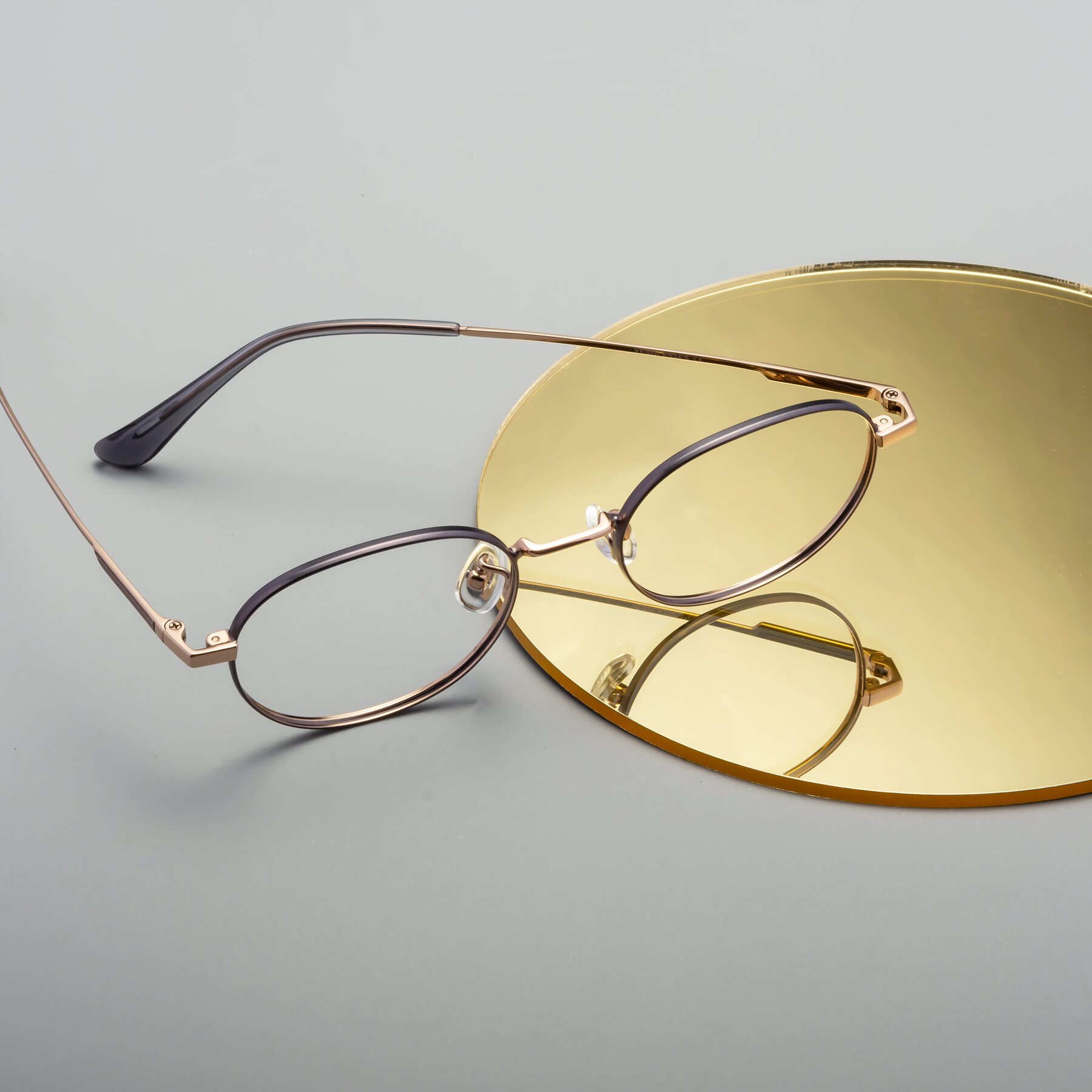 Lifestyle photography #2 of Tess in Gray-Gold with Clear Reading Eyeglass Lenses