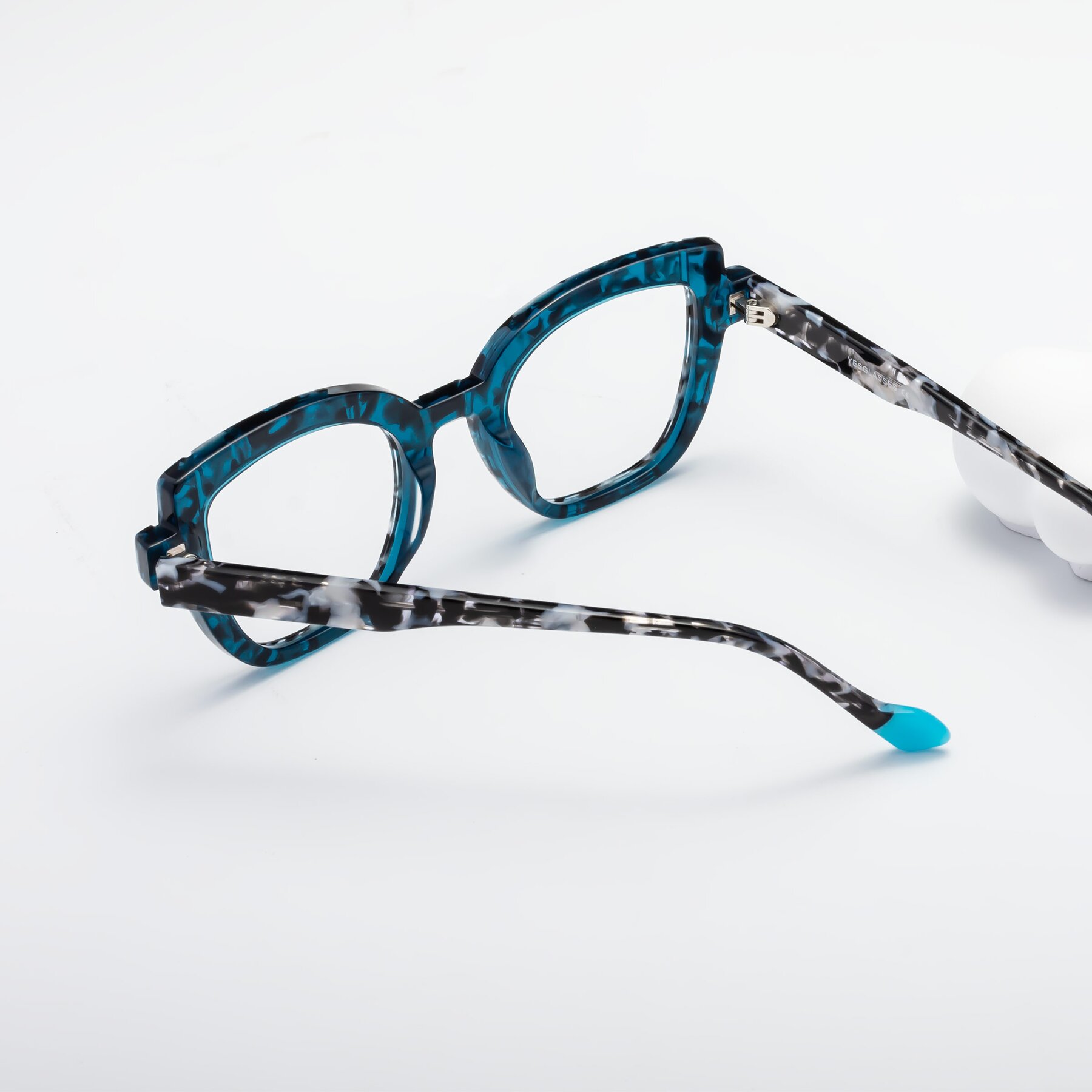 Women's lifestyle photography #2 of Sato in Tortoise Blue with Clear Eyeglass Lenses