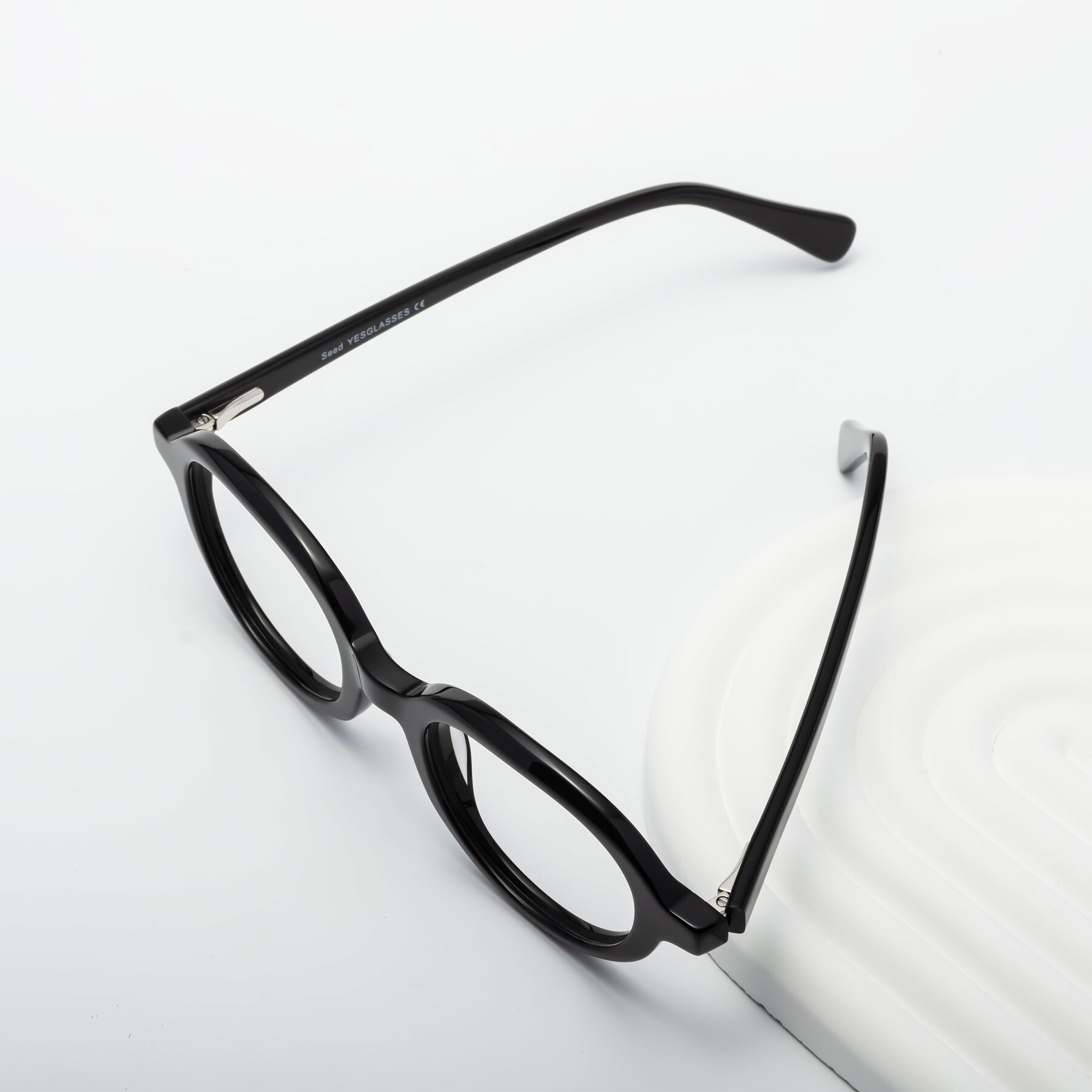 Lifestyle photography #2 of Seed in Black with Clear Blue Light Blocking Lenses