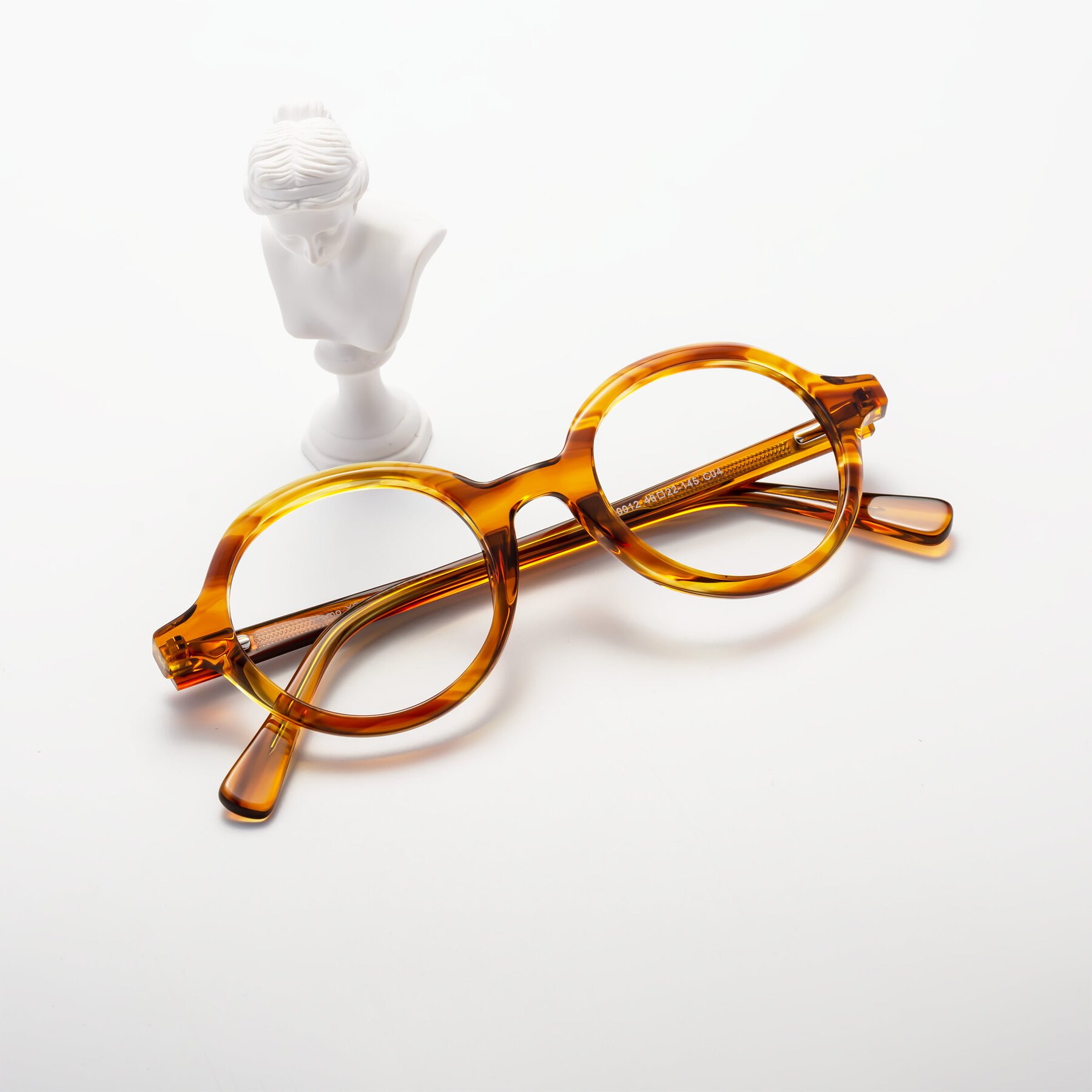 Lifestyle photography #1 of Nemo in Striped Amber with Clear Eyeglass Lenses