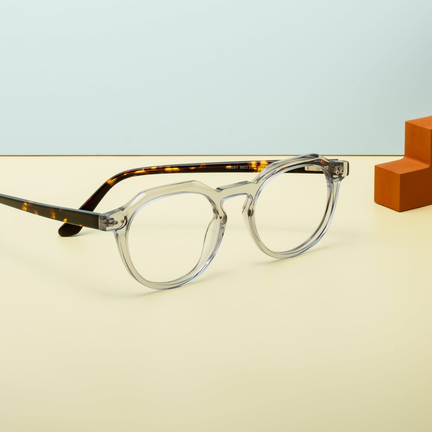 Lifestyle photography #2 of Dyson in Transparent Livid-Tortoise with Clear Blue Light Blocking Lenses