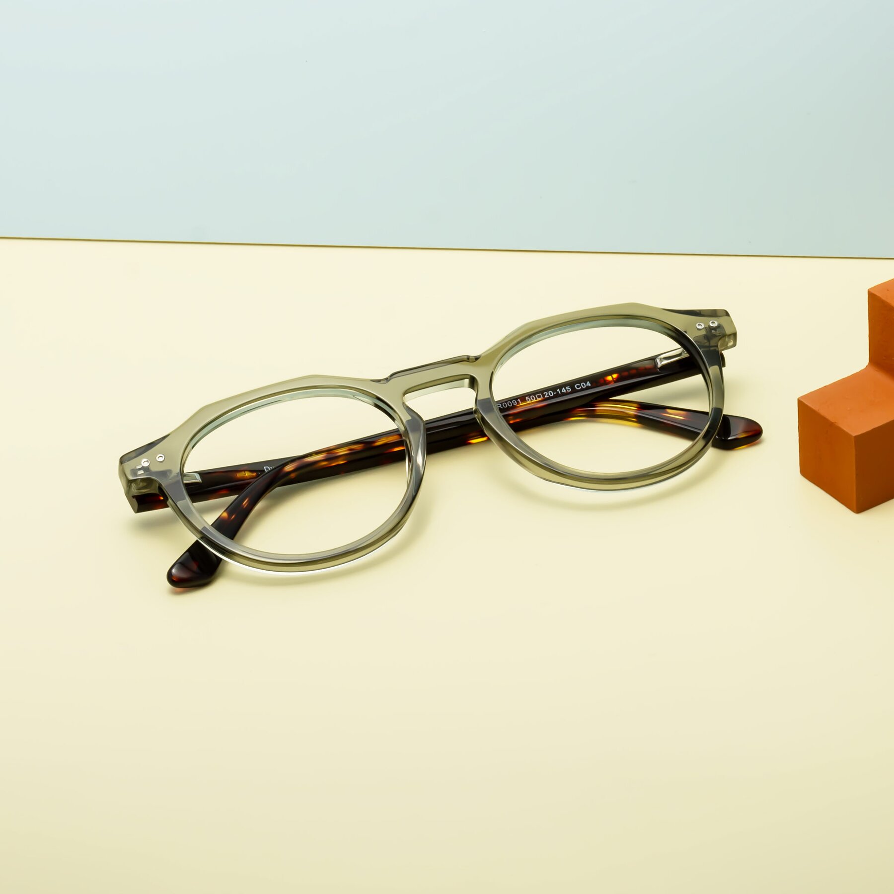 Lifestyle photography #1 of Dyson in Transparent Green-Tortoise with Clear Reading Eyeglass Lenses