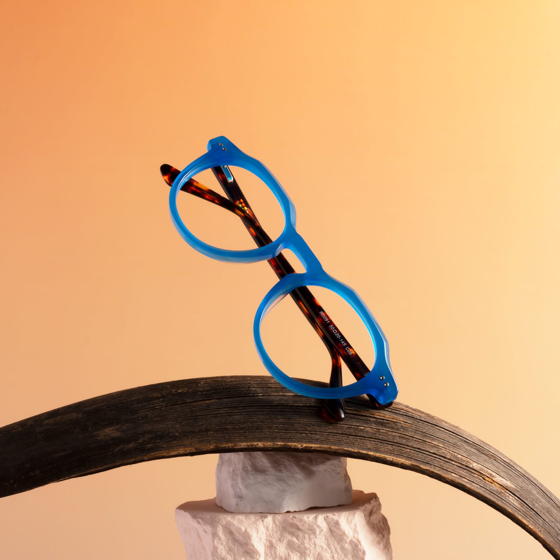 Lifestyle photography #1 of Dyson in Sky Blue-Tortoise with Clear Eyeglass Lenses