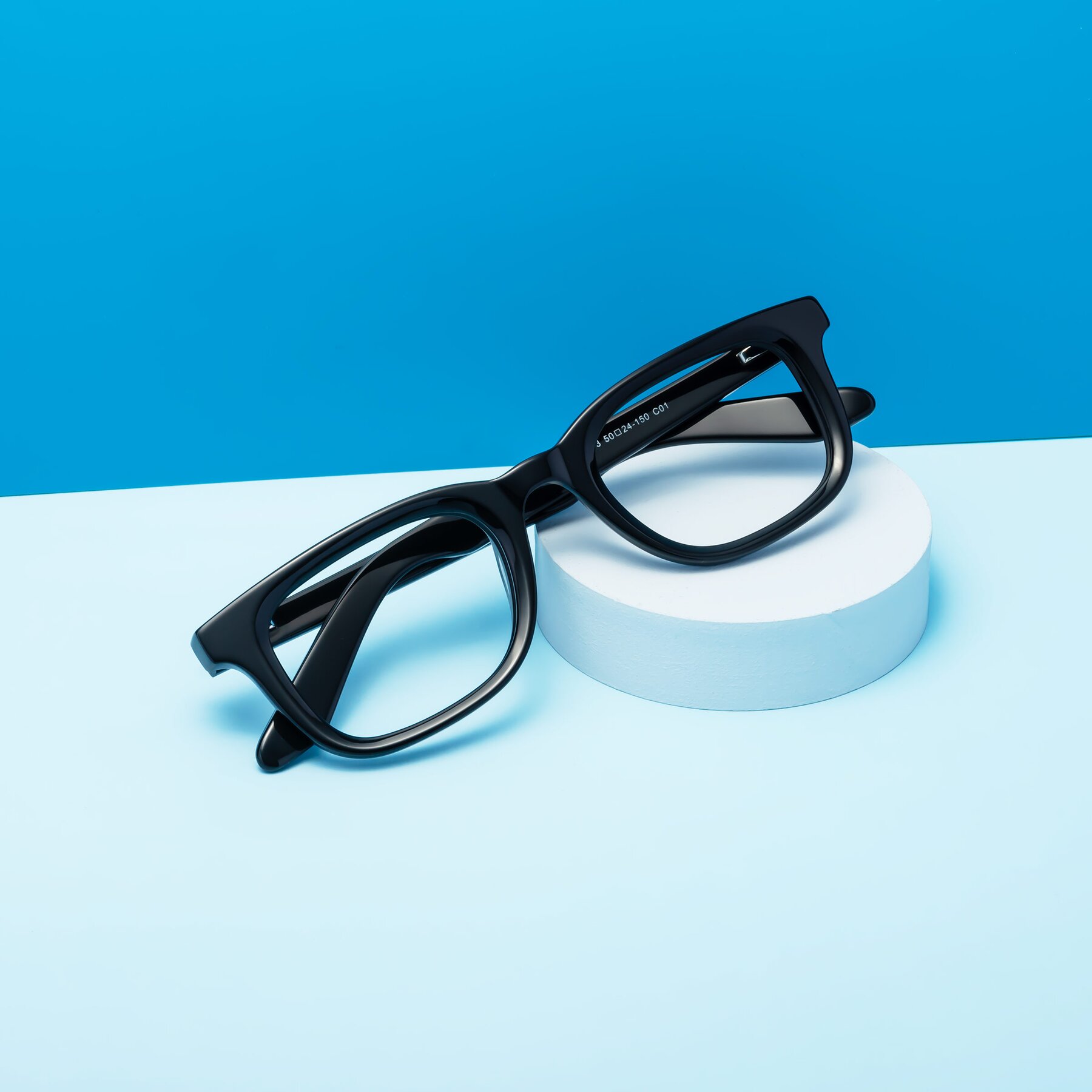 Lifestyle photography #1 of Reid in Black with Clear Blue Light Blocking Lenses