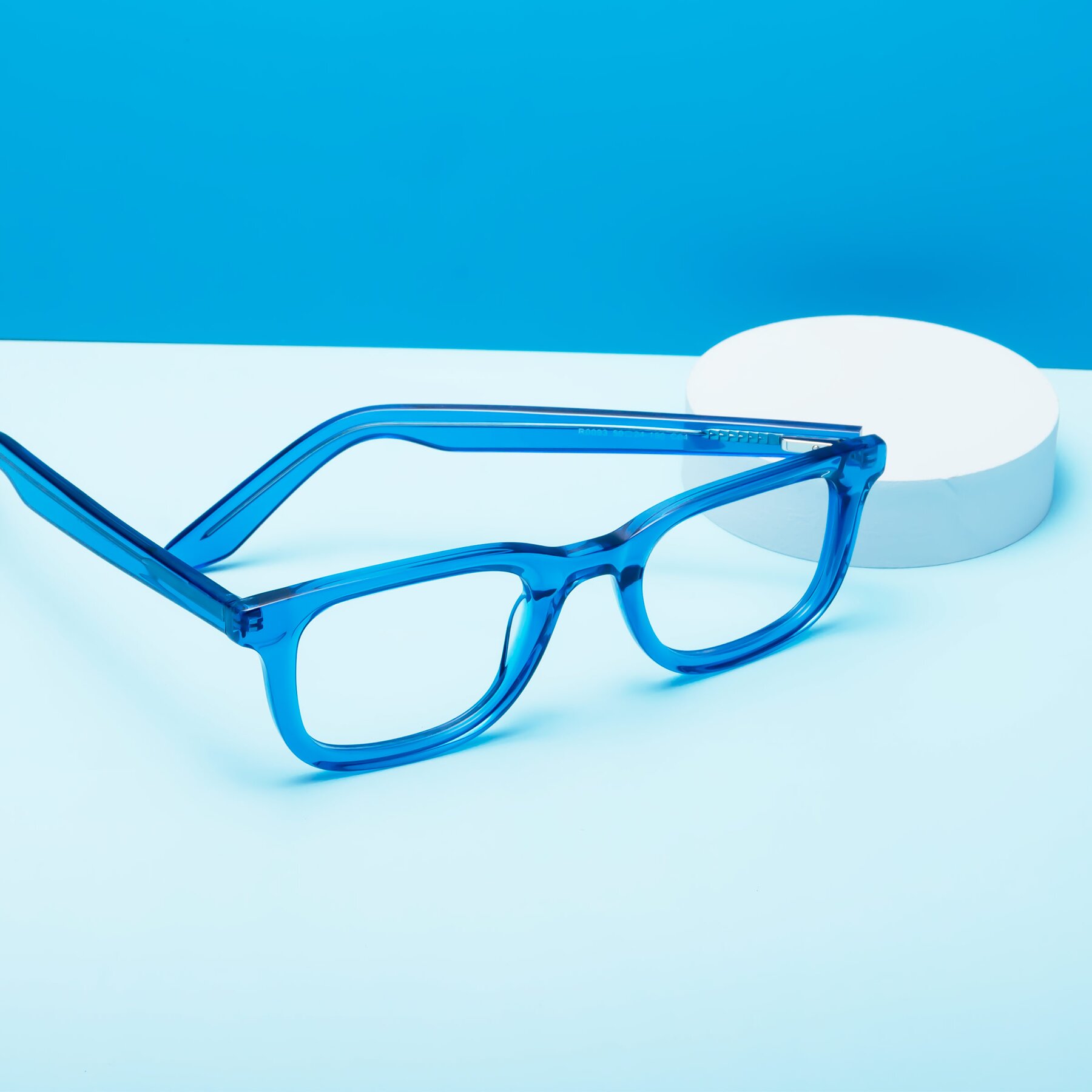Lifestyle photography #2 of Reid in Crystal Blue with Clear Eyeglass Lenses