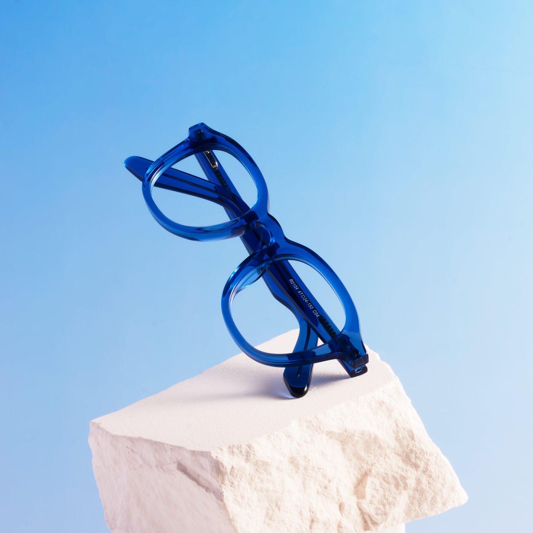 Lifestyle photography #1 of Titus in Translucent Blue with Clear Reading Eyeglass Lenses