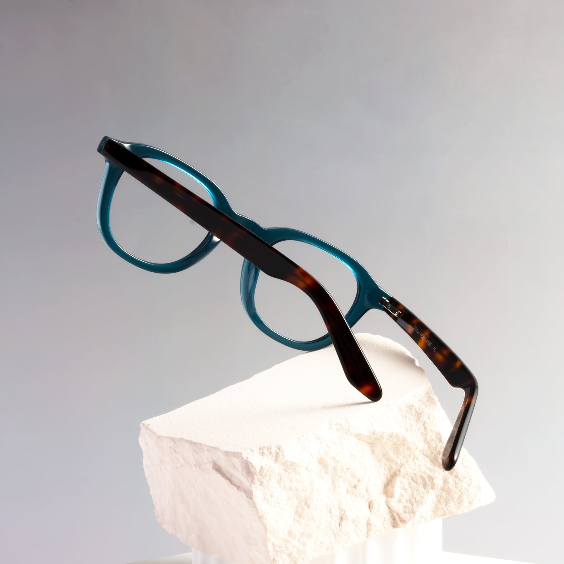 Lifestyle photography #2 of Titus in Peacock-Tortoise with Clear Eyeglass Lenses