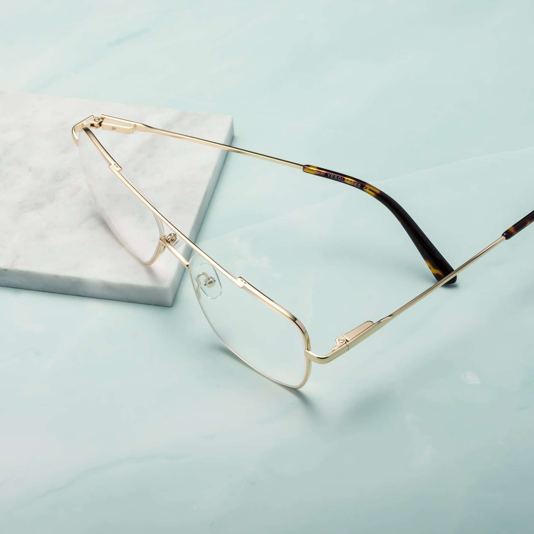 Lifestyle photography #2 of Jever in Gold with Clear Reading Eyeglass Lenses