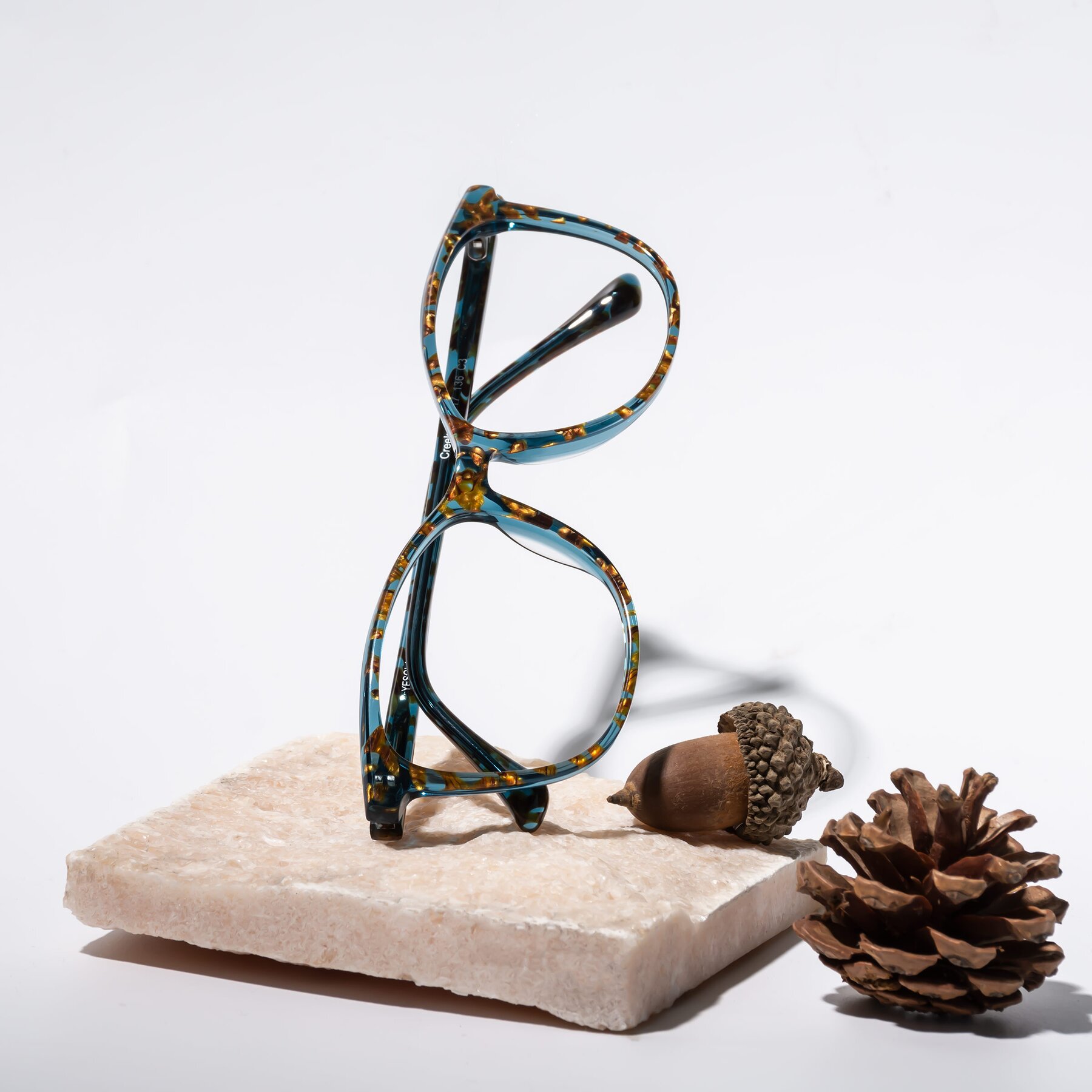 Women's lifestyle photography #1 of Creek in Ocean Blue Floral with Clear Reading Eyeglass Lenses