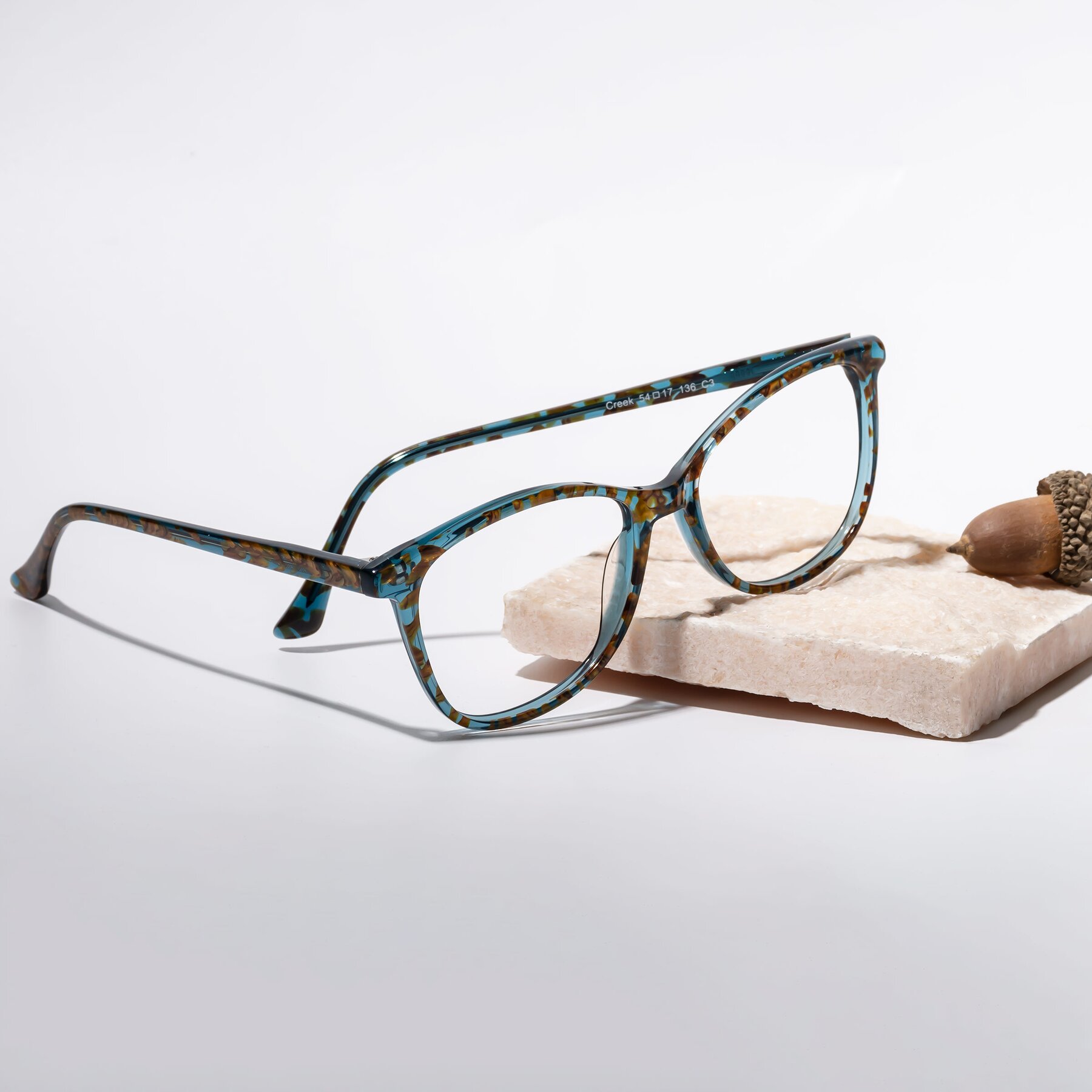 Women's lifestyle photography #2 of Creek in Ocean Blue Floral with Clear Reading Eyeglass Lenses