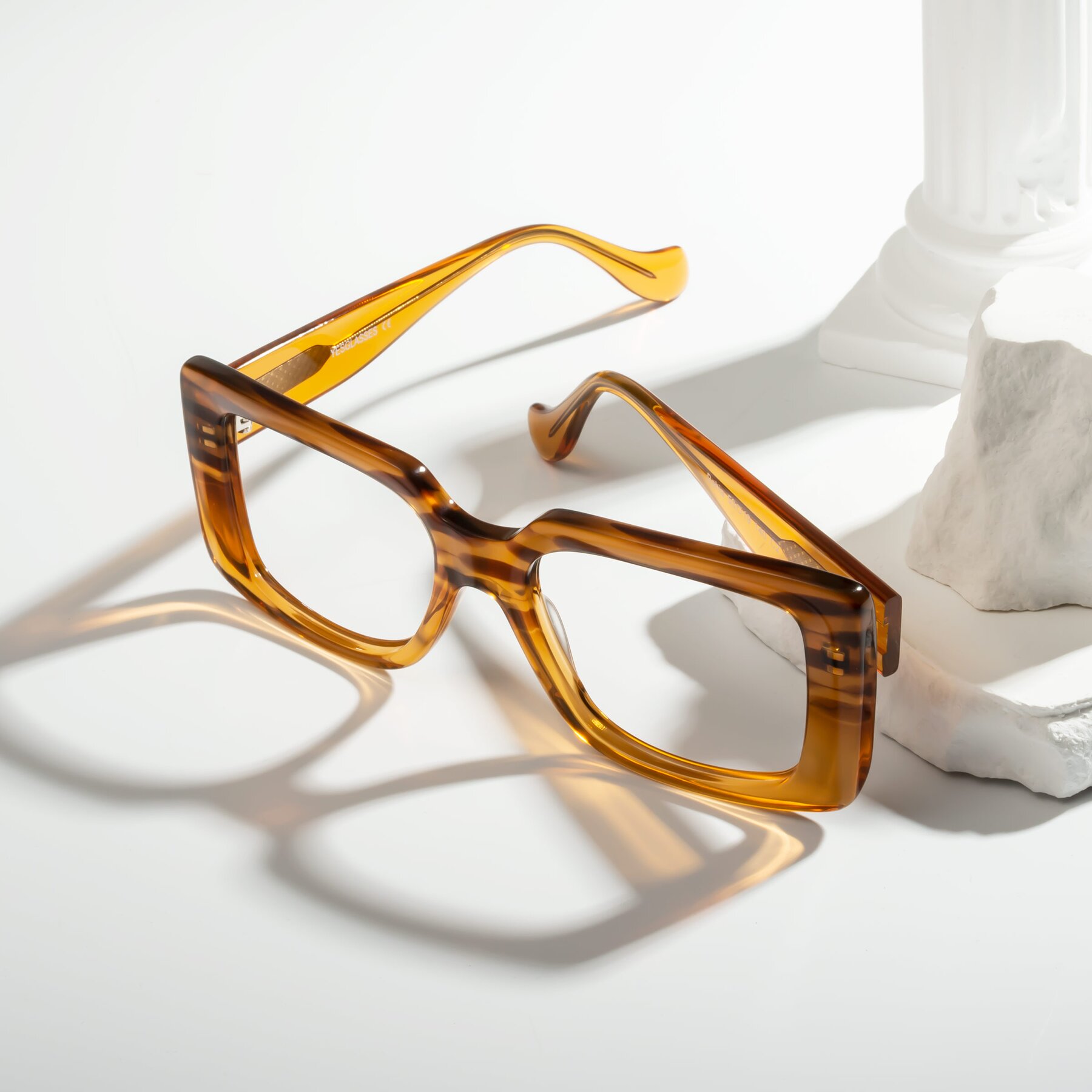 Lifestyle photography #2 of Bahia in Amber Striped with Clear Eyeglass Lenses
