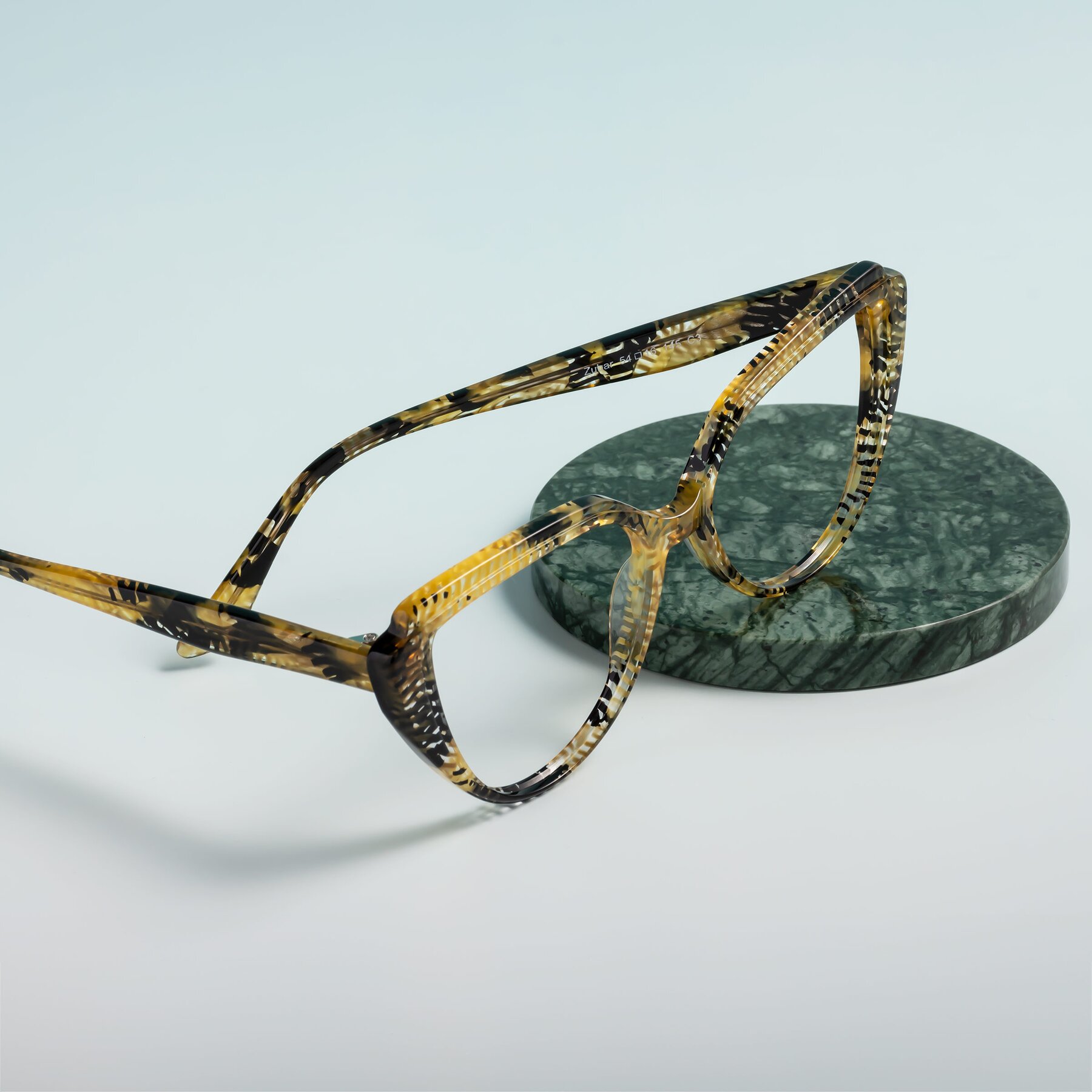 Women's lifestyle photography #2 of Zubar in Yellow Snake Print with Clear Eyeglass Lenses