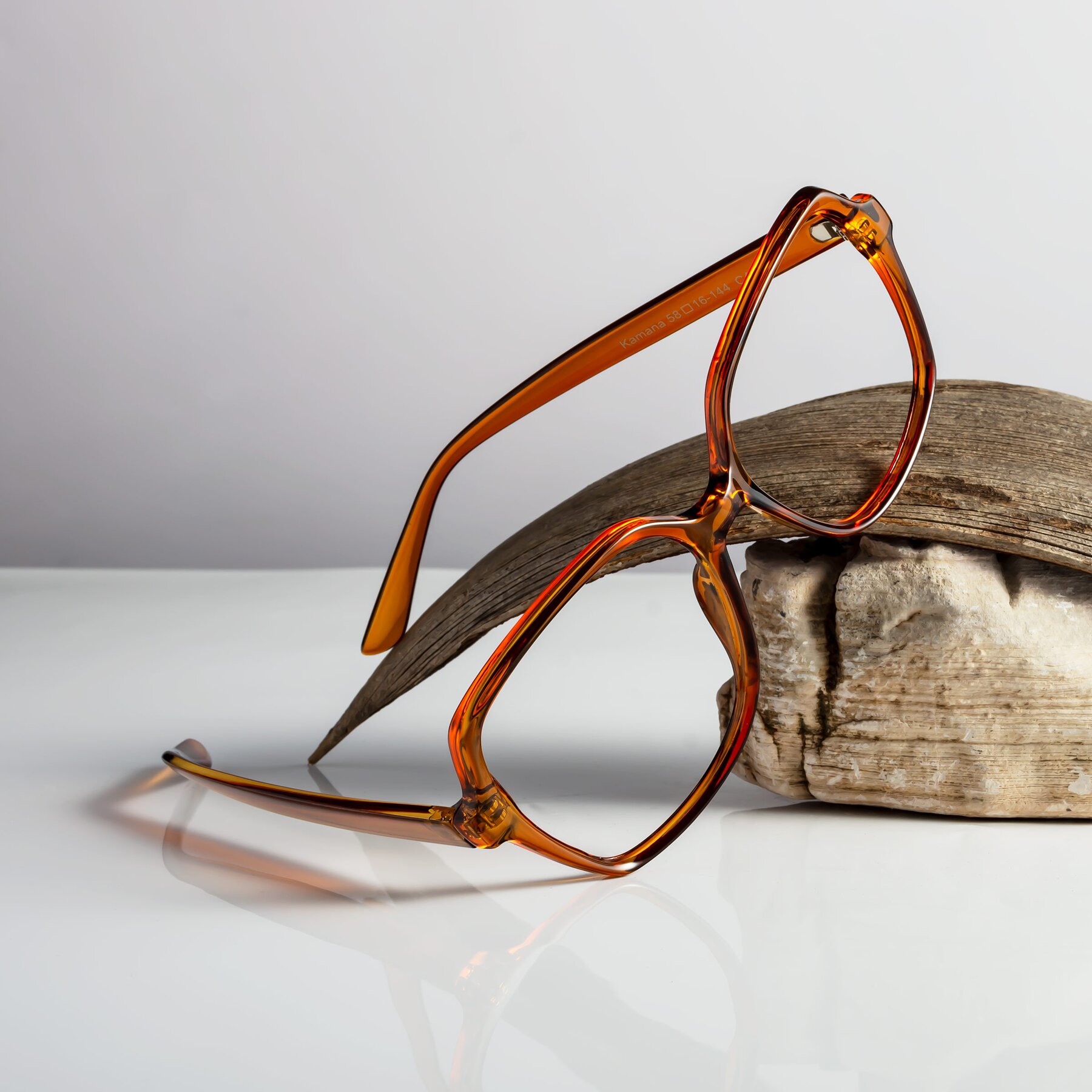 Women's lifestyle photography #2 of Kamana in Maple Syrup with Clear Reading Eyeglass Lenses