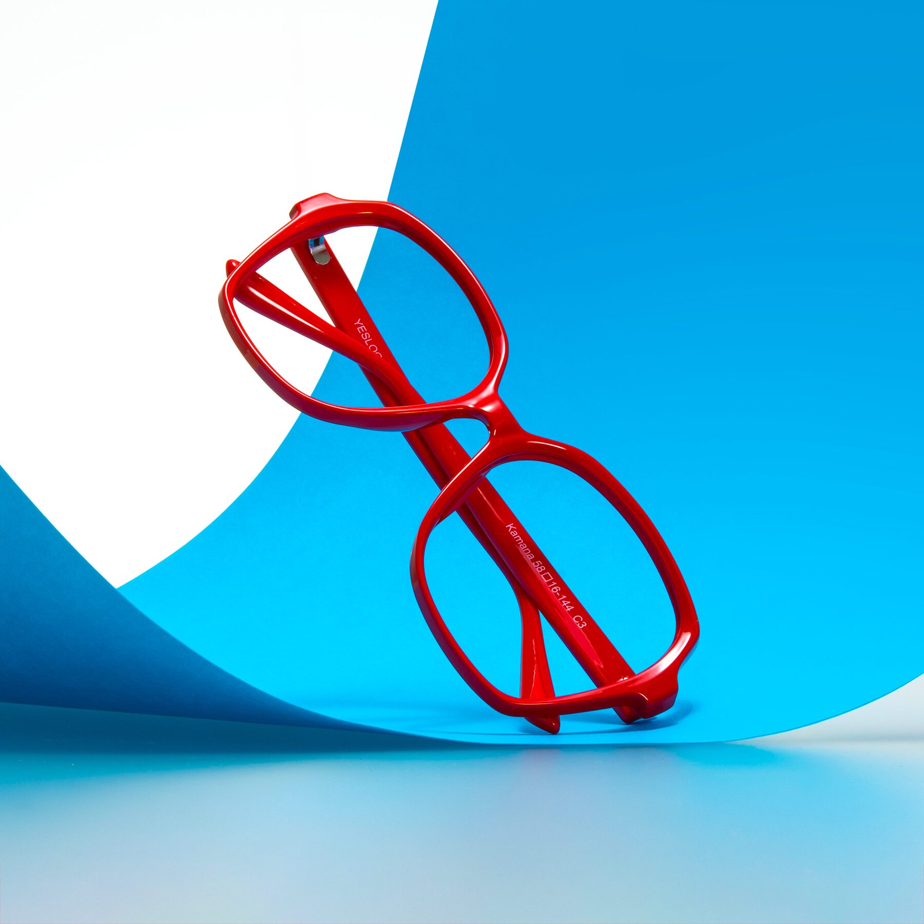Lifestyle photography #2 of Kamana in Red with Clear Reading Eyeglass Lenses