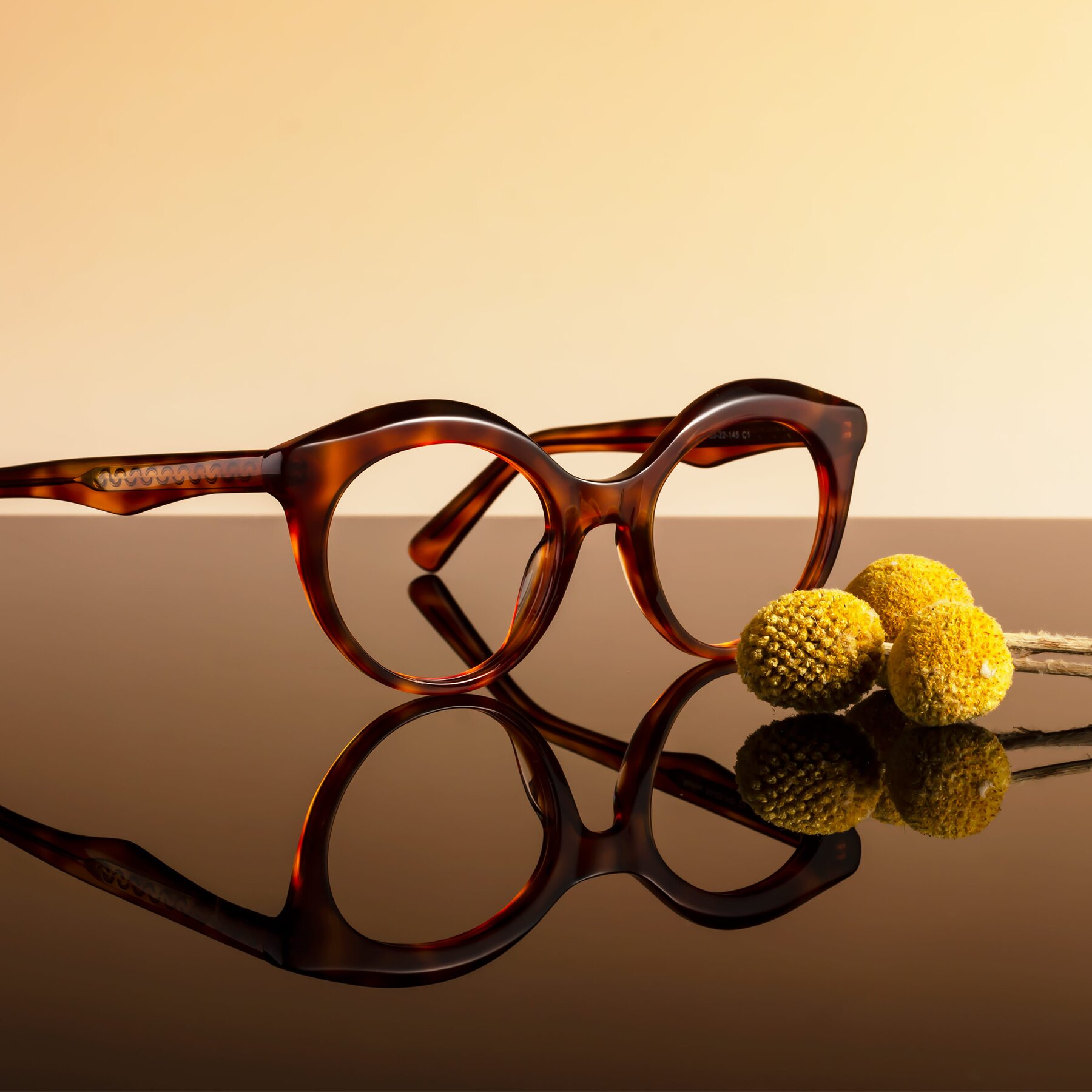 Women's lifestyle photography #2 of Barbie in Amber Tortoise with Clear Reading Eyeglass Lenses