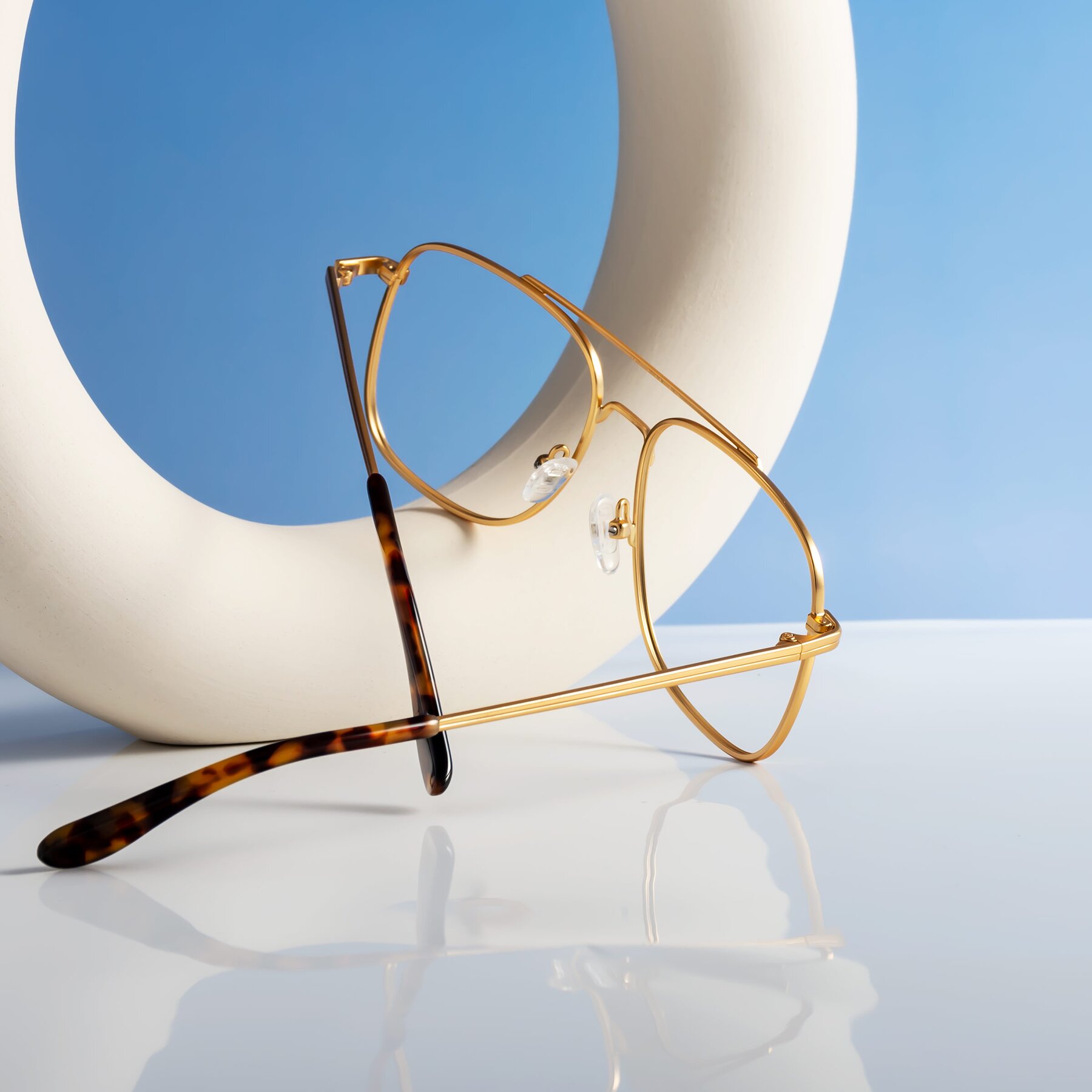 Lifestyle photography #2 of Merry in Matte Gold with Clear Reading Eyeglass Lenses