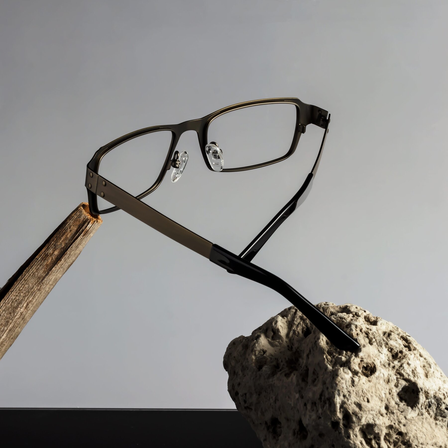 Lifestyle photography #2 of Moss in Bronze with Clear Blue Light Blocking Lenses