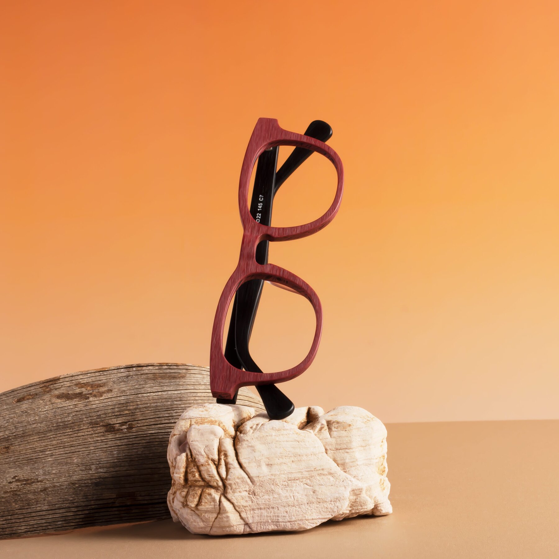 Lifestyle photography #1 of Tonia in Burgundy-Black Woodgrain with Clear Reading Eyeglass Lenses