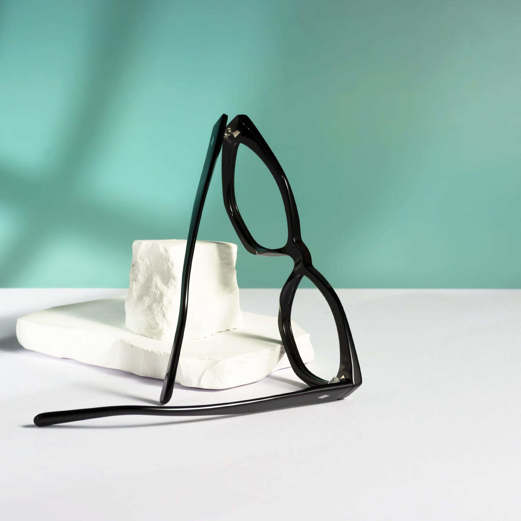 Lifestyle photography #2 of Delphi in Black with Clear Blue Light Blocking Lenses