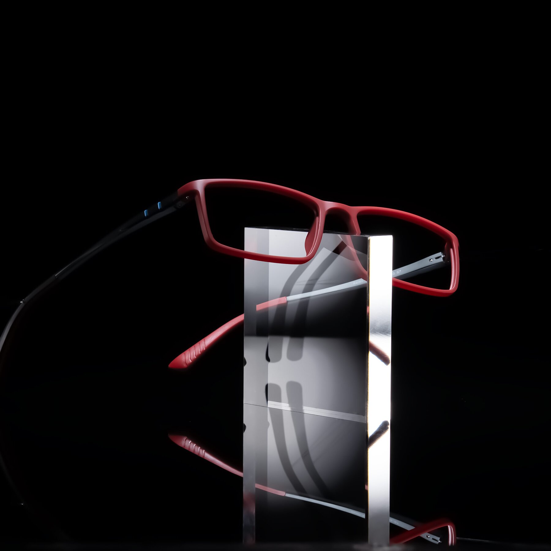 Lifestyle photography #2 of Kordii in Matte Red/Silver with Clear Eyeglass Lenses