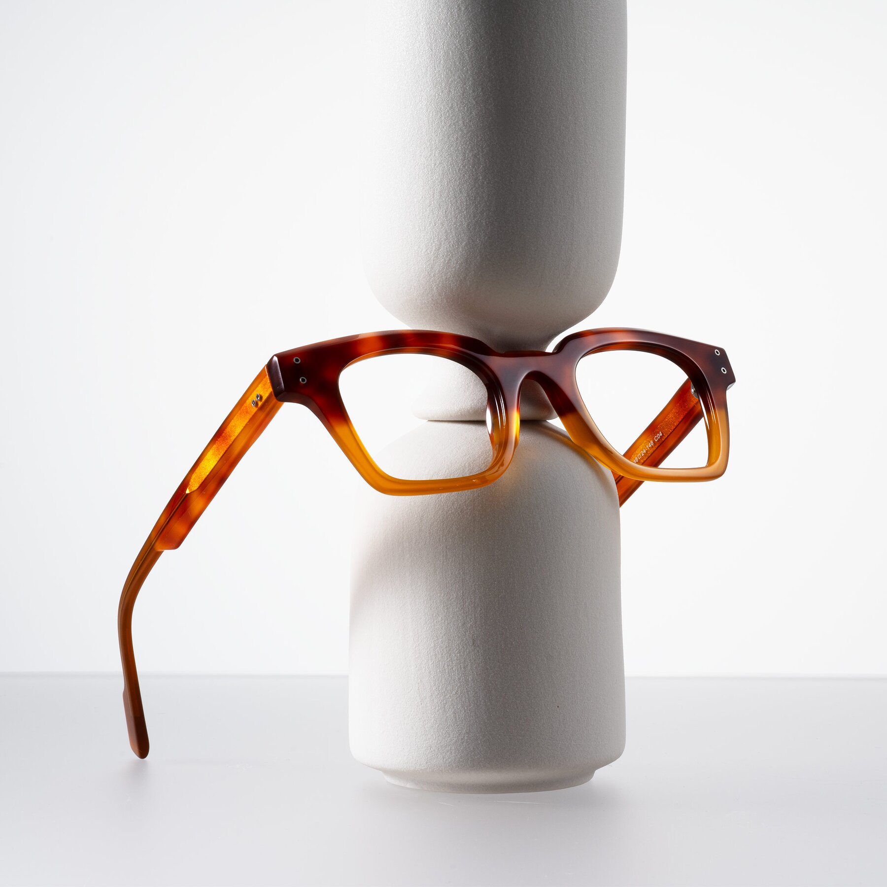 Lifestyle photography #2 of Perez in Tortoise/Amber with Clear Eyeglass Lenses