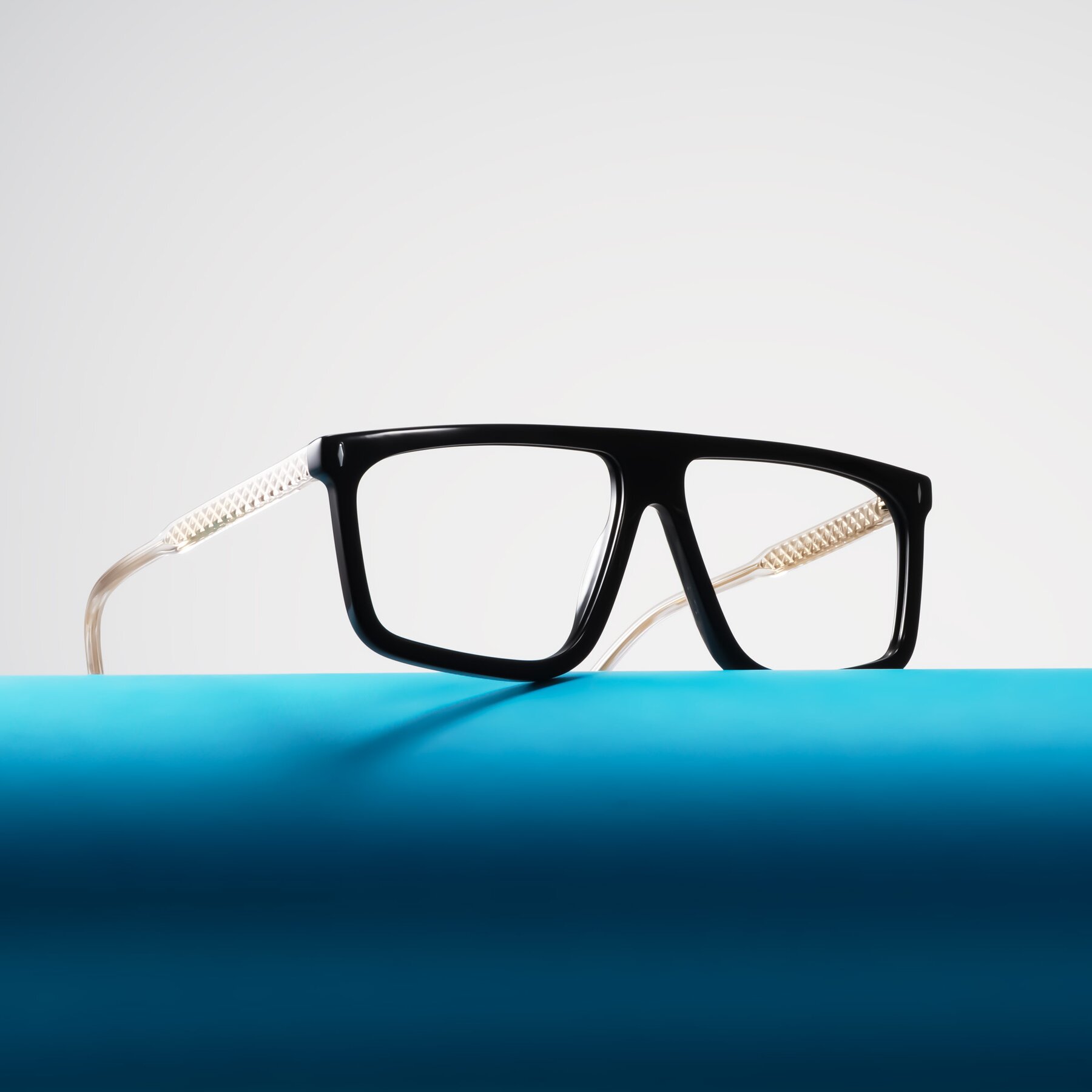 Lifestyle photography #2 of Vazquez in Black/Gold with Clear Blue Light Blocking Lenses