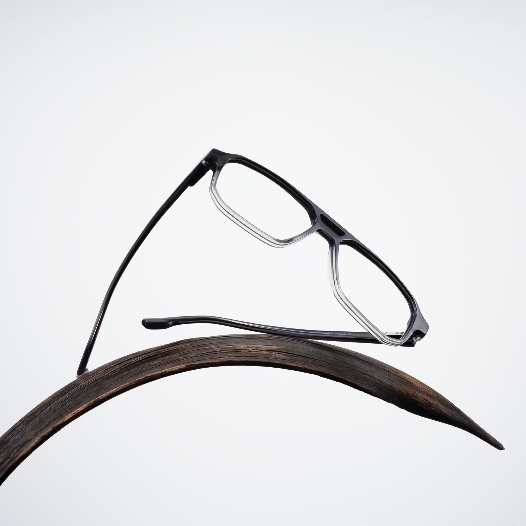 Lifestyle photography #1 of DeMiko in Gradient Gray with Clear Eyeglass Lenses