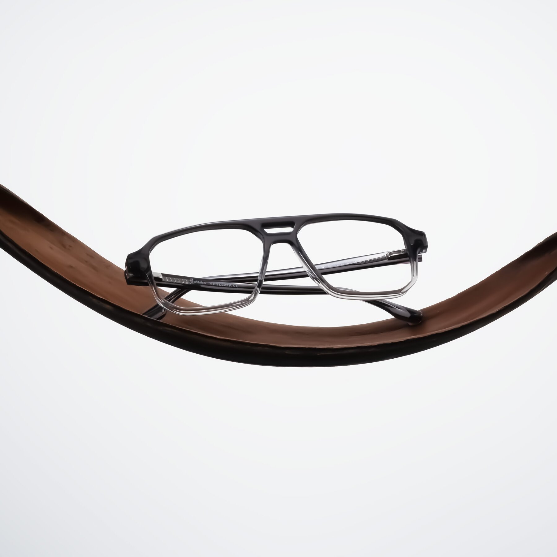 Lifestyle photography #2 of DeMiko in Gradient Gray with Clear Eyeglass Lenses