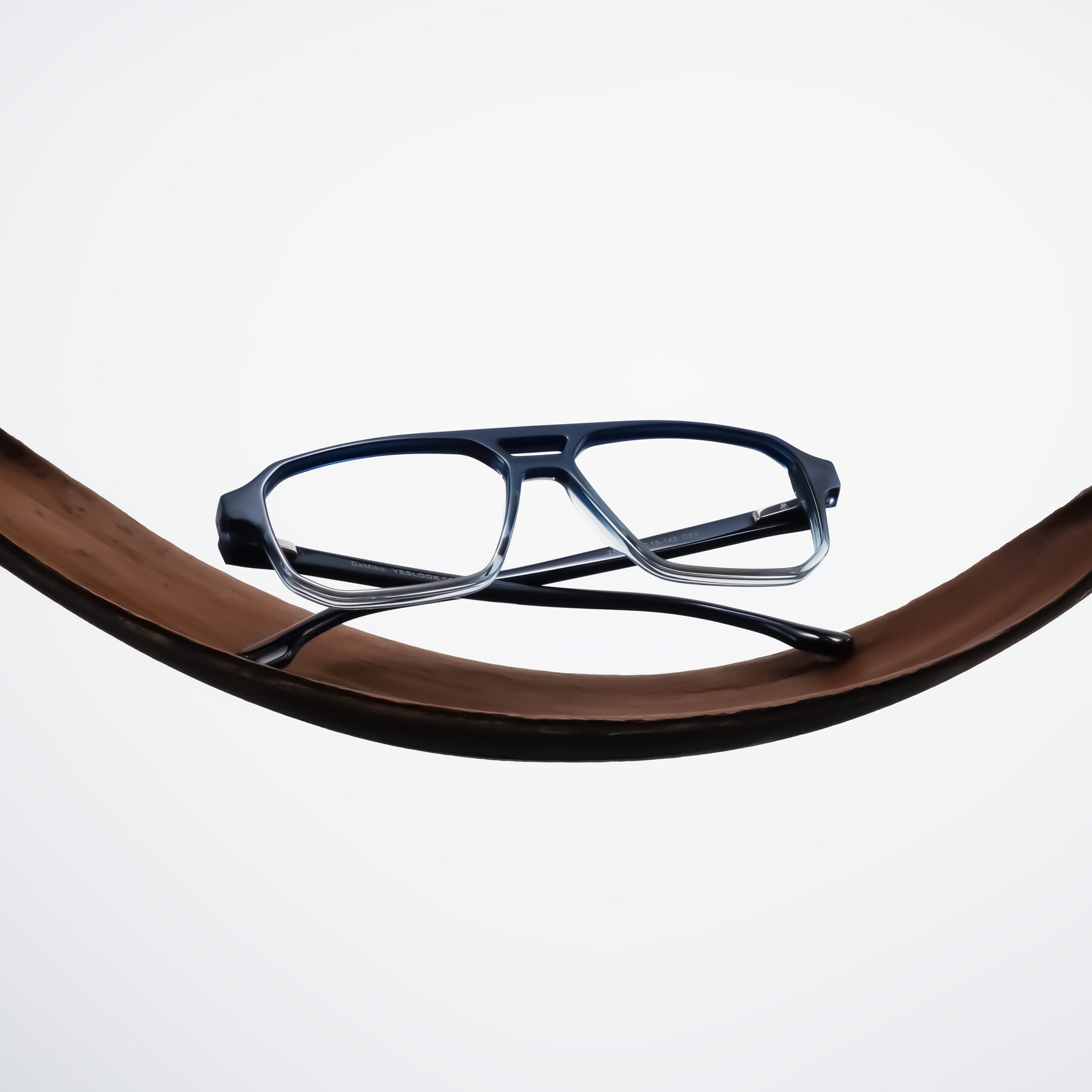 Lifestyle photography #2 of DeMiko in Gradient Blue with Clear Eyeglass Lenses