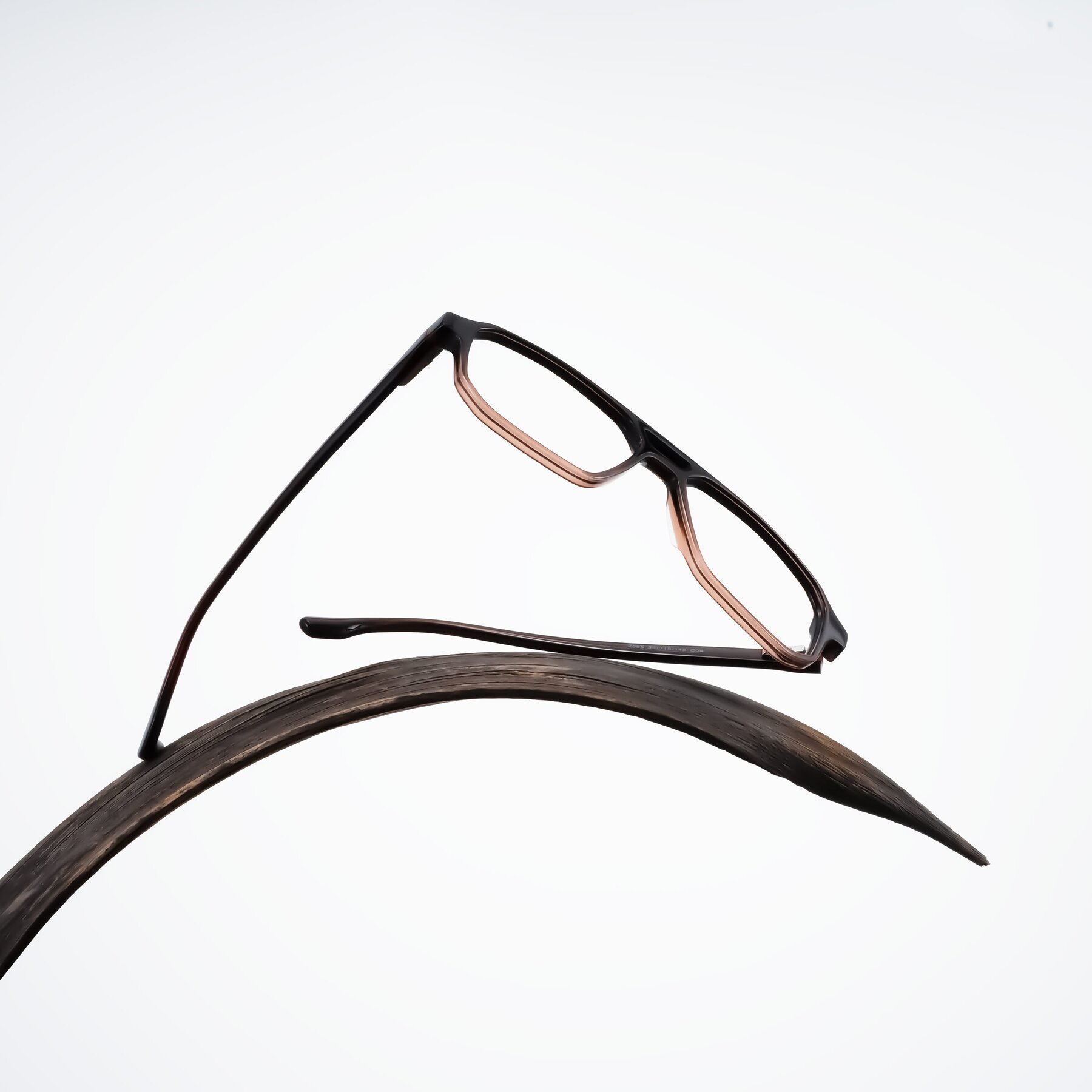 Lifestyle photography #1 of DeMiko in Gradient Brown with Clear Eyeglass Lenses