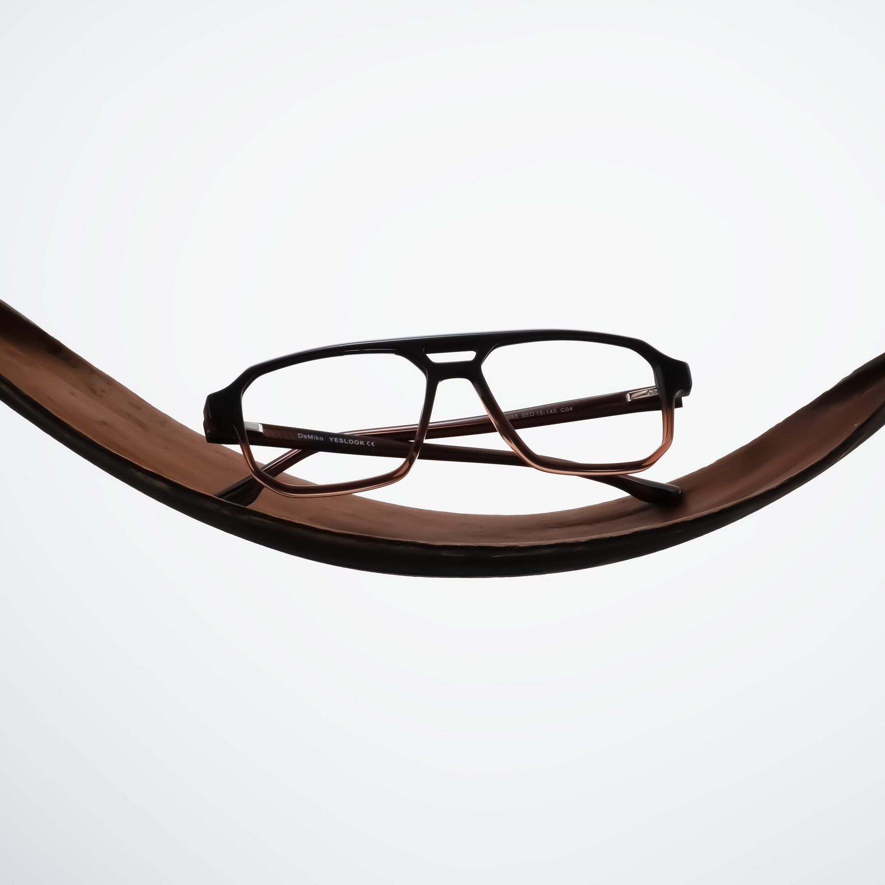 Lifestyle photography #2 of DeMiko in Gradient Brown with Clear Eyeglass Lenses