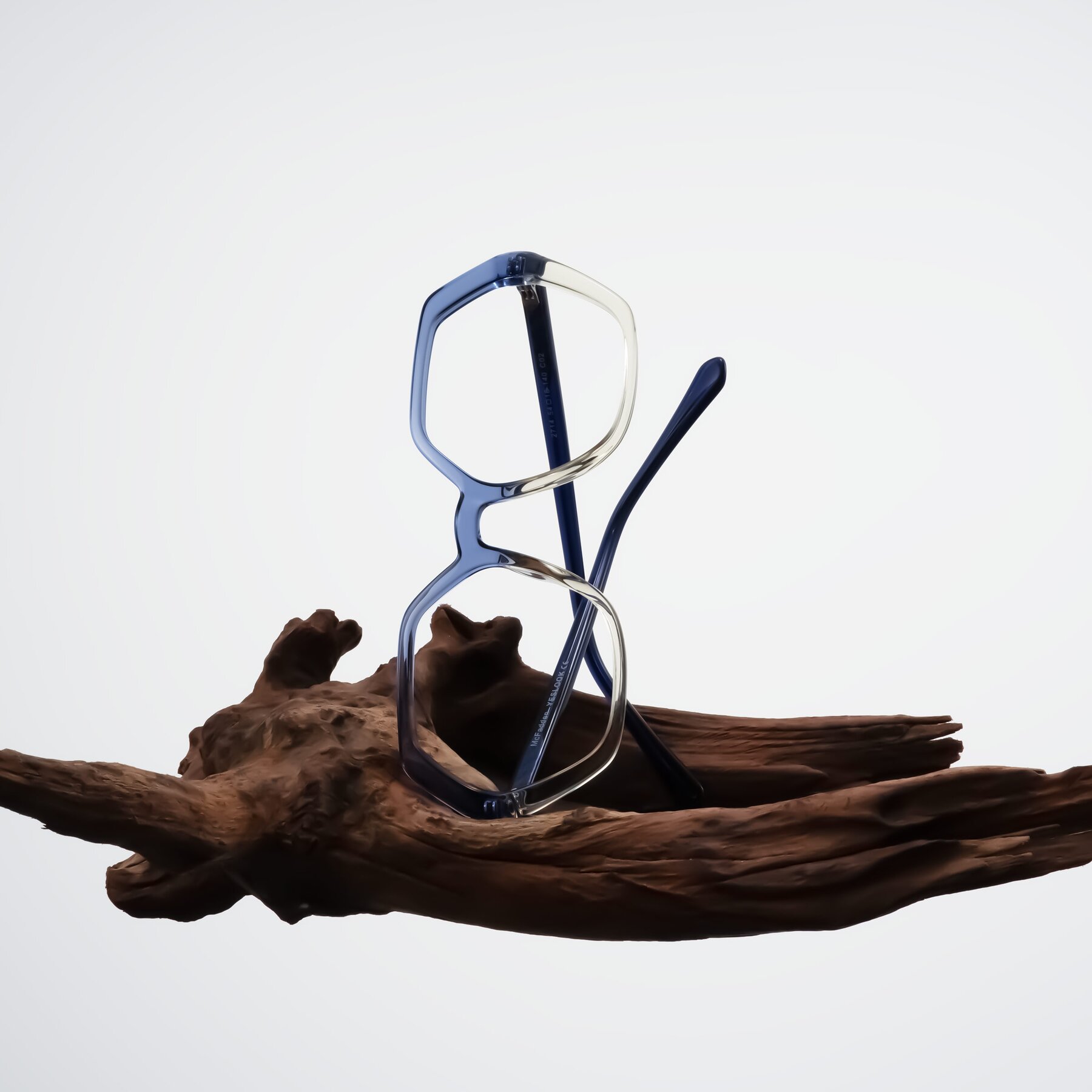 Lifestyle photography #2 of McFadden in Clear Blue/Clear Green with Clear Eyeglass Lenses