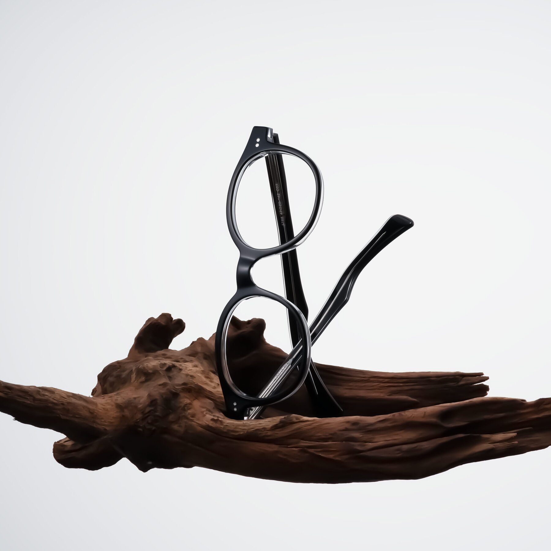 Lifestyle photography #2 of Kaju in Black/Clear with Clear Eyeglass Lenses