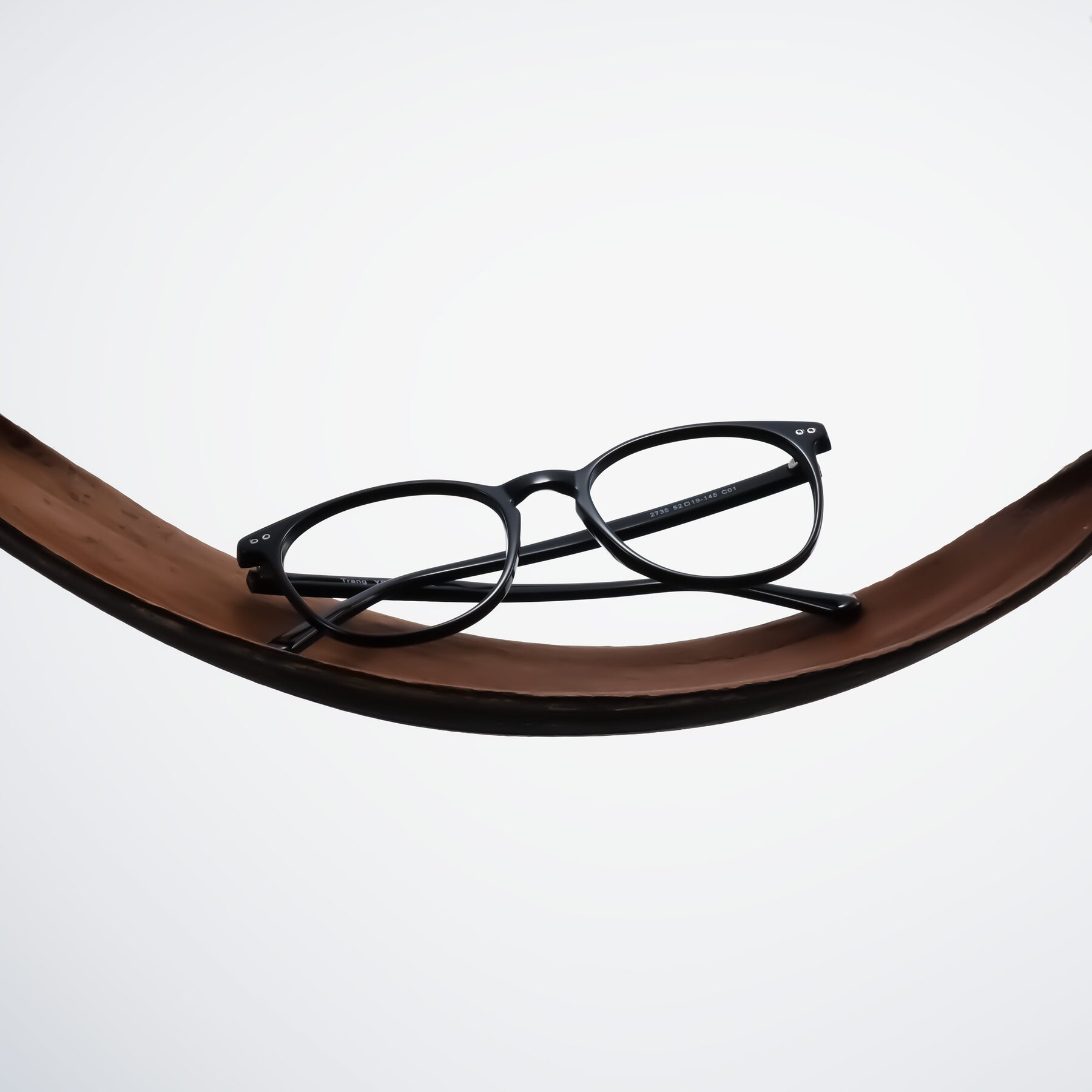 Lifestyle photography #1 of Trang in Black with Clear Reading Eyeglass Lenses
