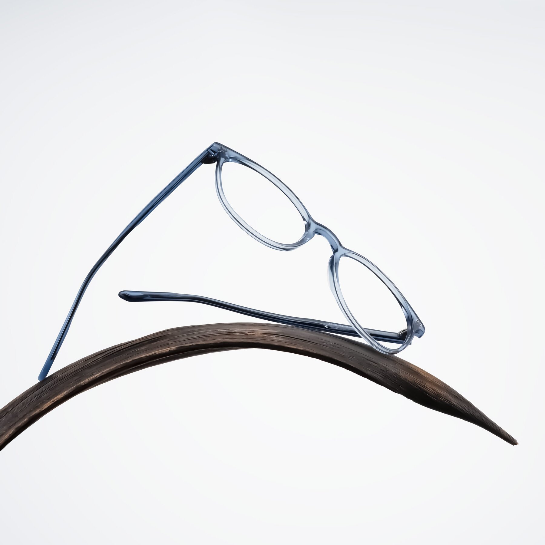 Lifestyle photography #2 of Trang in Transparent Blue with Clear Reading Eyeglass Lenses