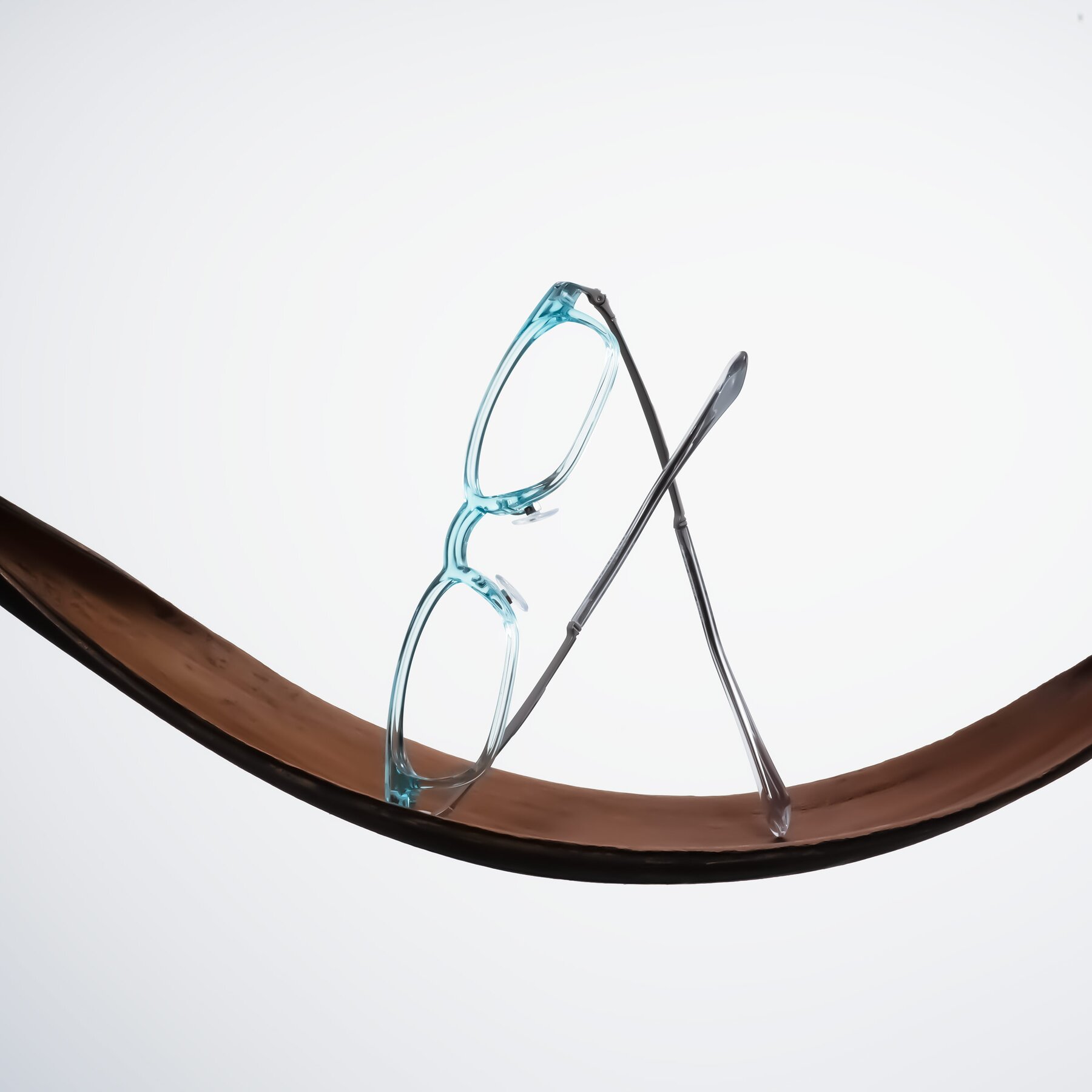 Lifestyle photography #2 of Tiwari in Clear Blue/Silver with Clear Eyeglass Lenses