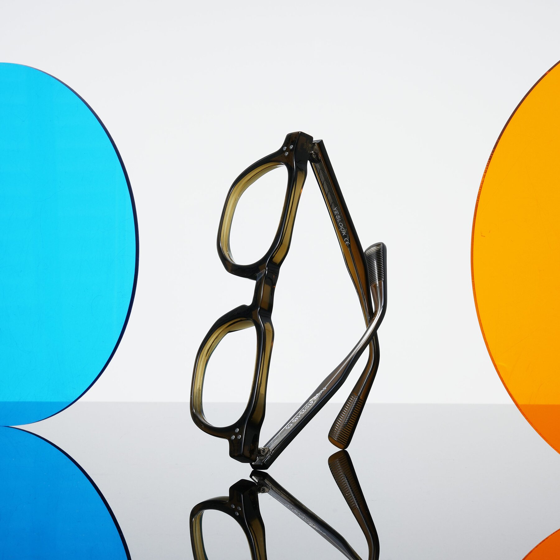 Lifestyle photography #2 of Fingar in Translucent Olive Gray with Clear Eyeglass Lenses