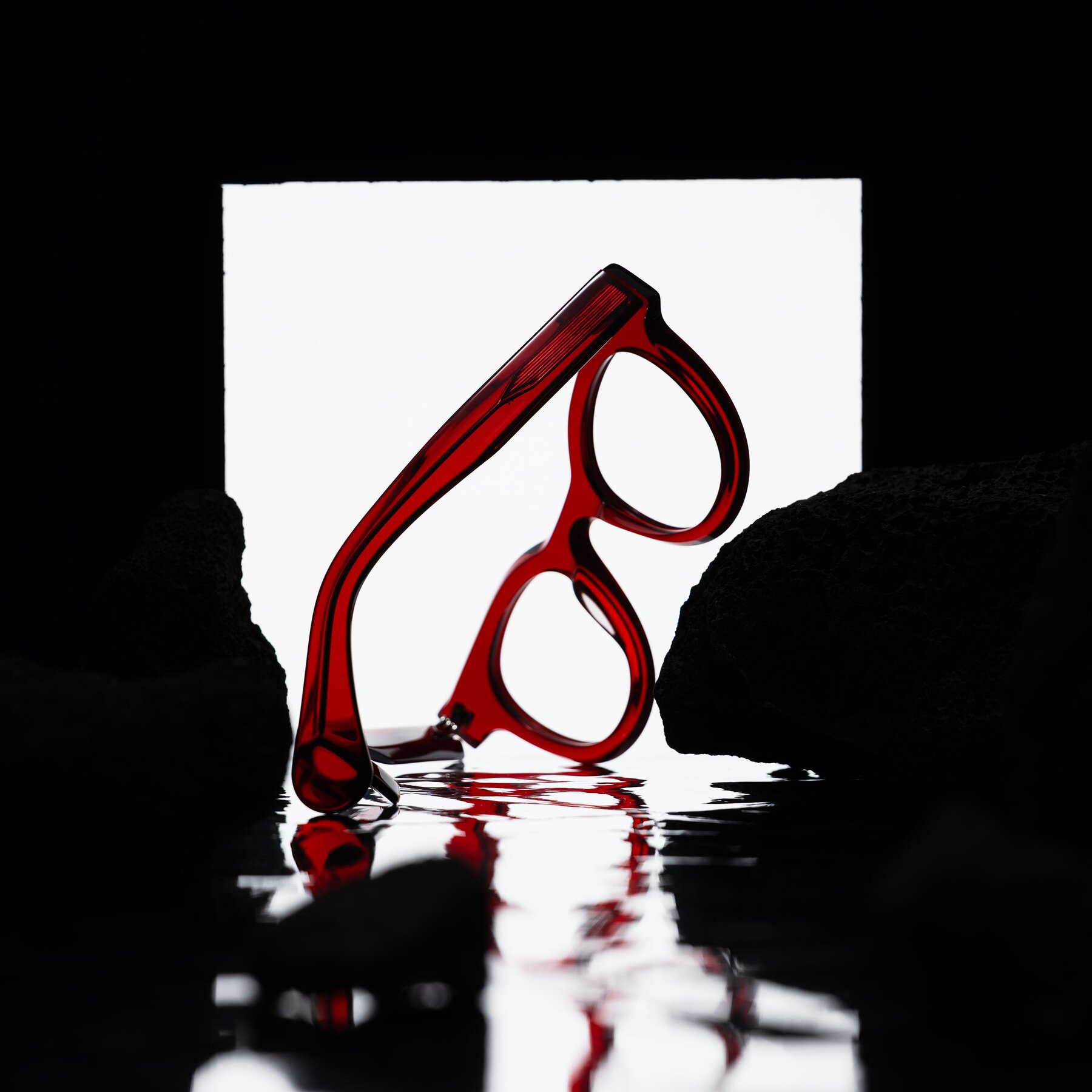 Lifestyle photography #2 of Embracing in Wine with Clear Eyeglass Lenses