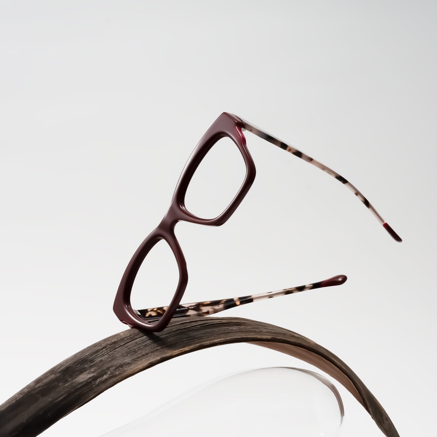 Lifestyle photography #1 of Yatole in Maroon/Ivory Tortoise with Clear Eyeglass Lenses