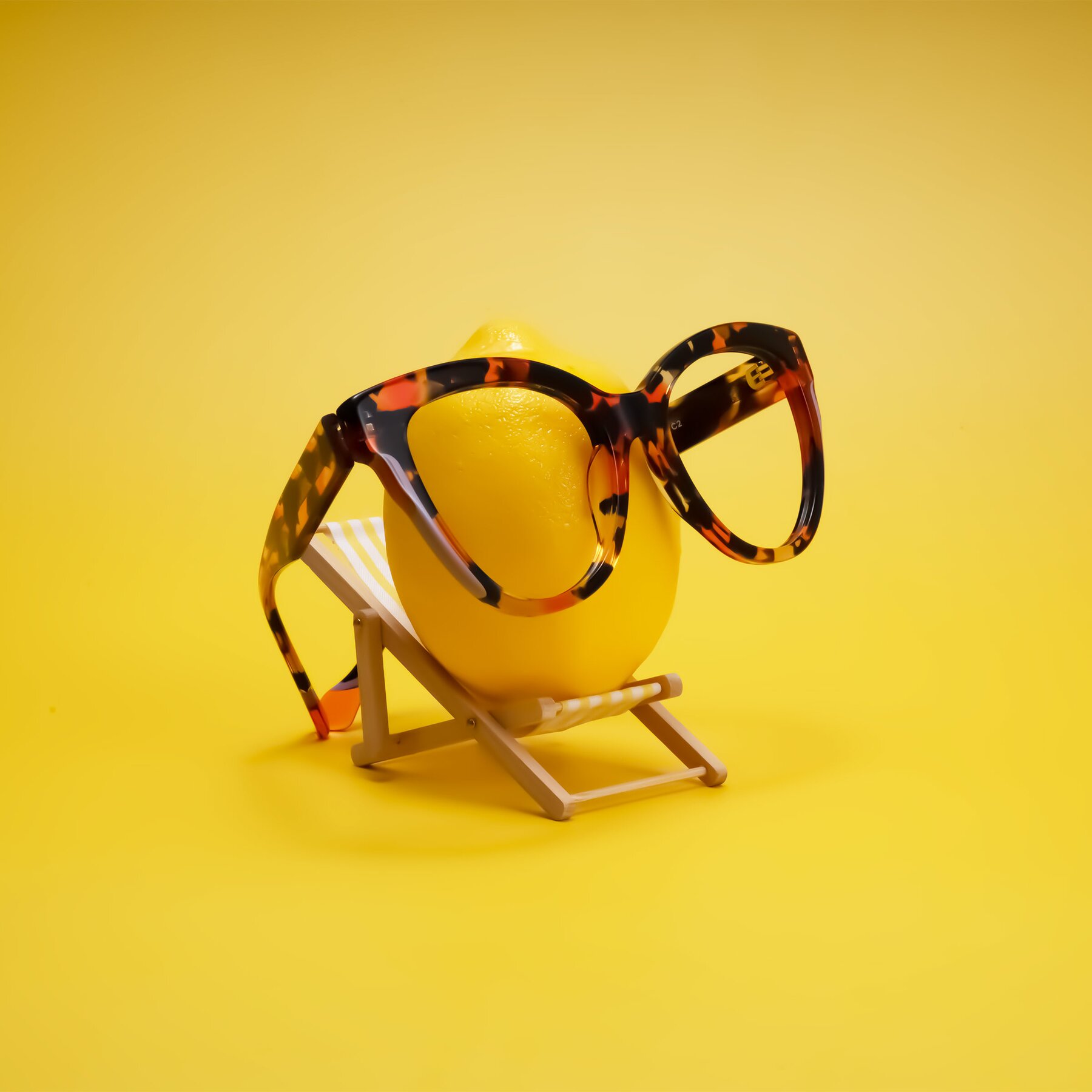Lifestyle photography #2 of Yalkin in Orange Tortoise with Clear Eyeglass Lenses